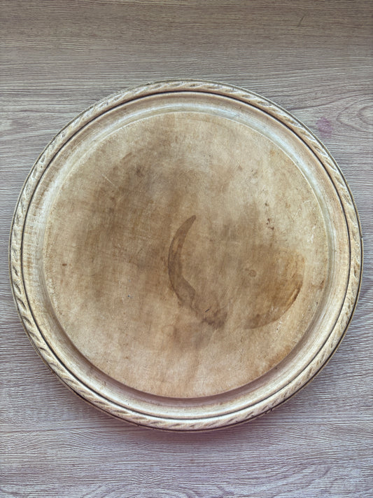 Old wooden carved bread board