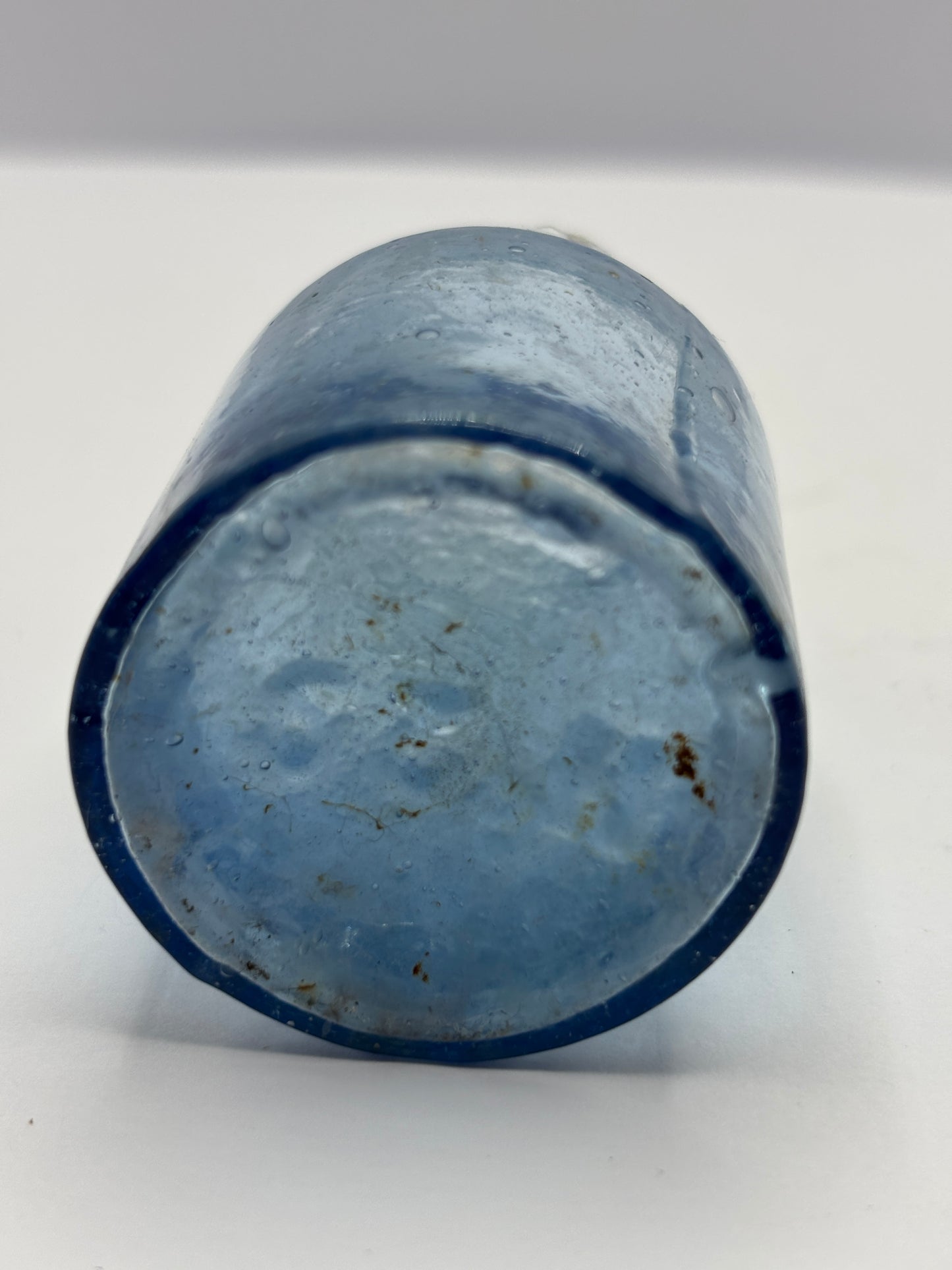 Old glass rat paste bottle