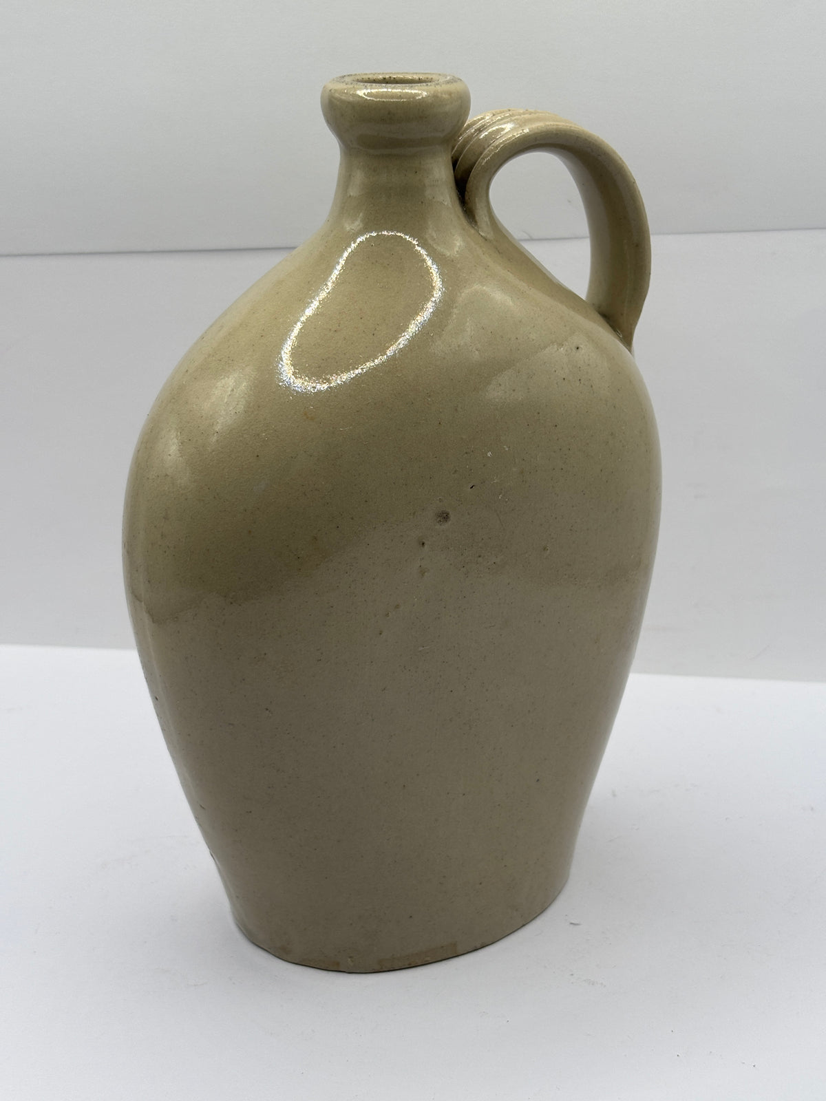 Old off white stoneware handled flask