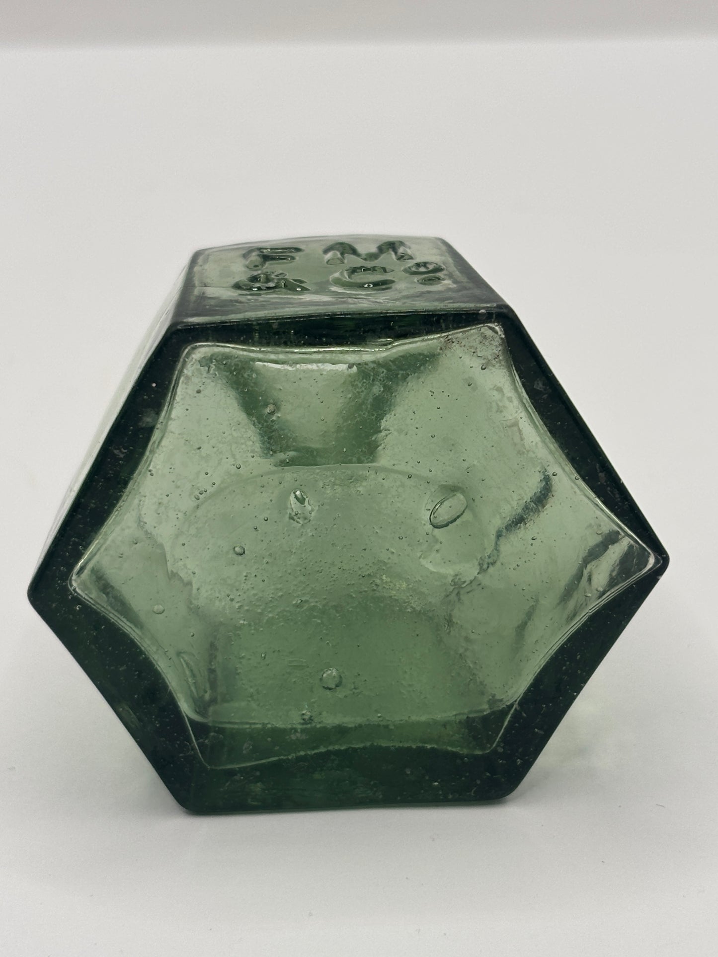 Old green glass advertising inkwell, penny ink, FM & Co