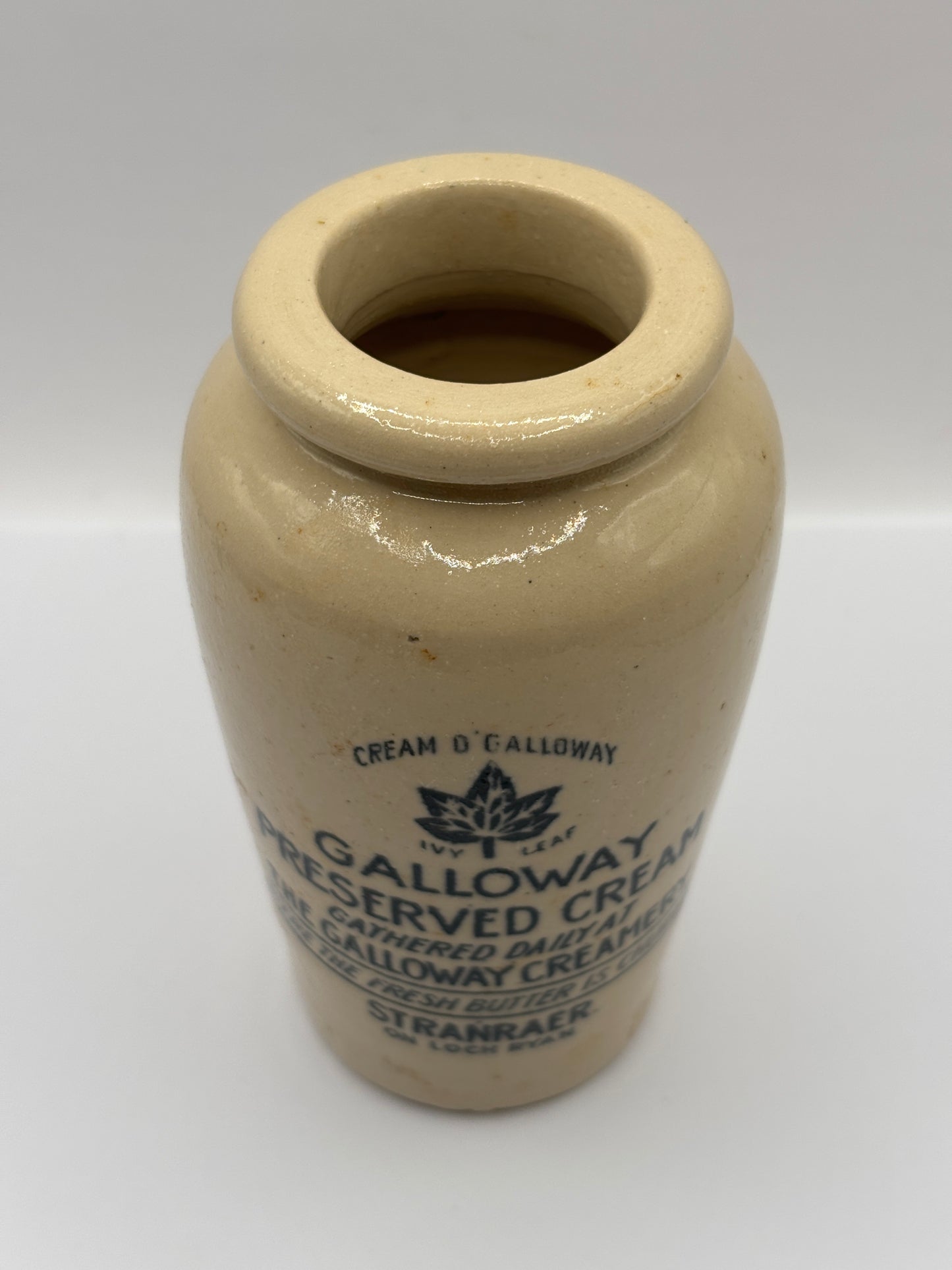 Old advertising cream pot, Galloway creamery Stranraer. Damaged