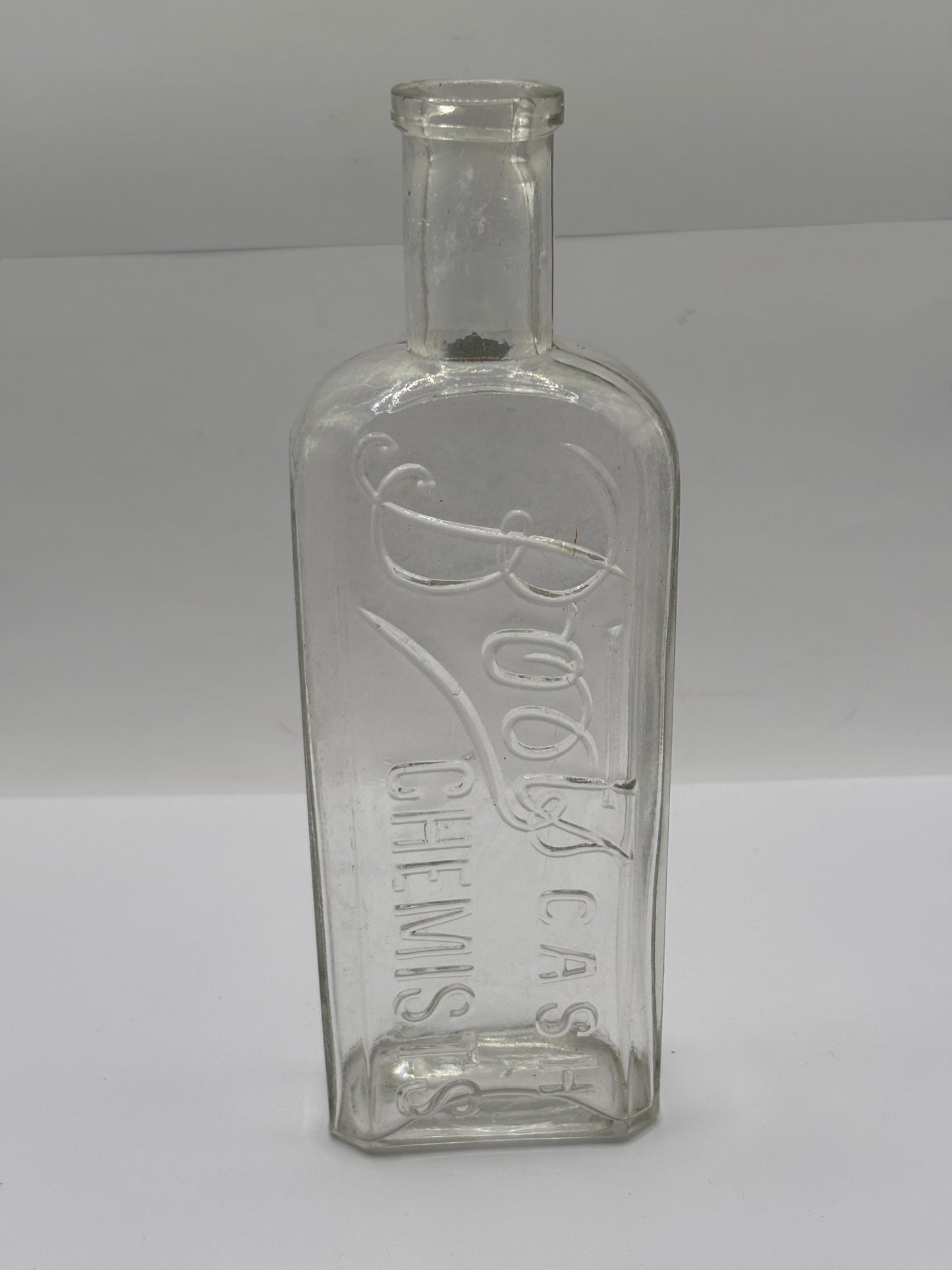 Old clear glass Boots cash chemists bottle