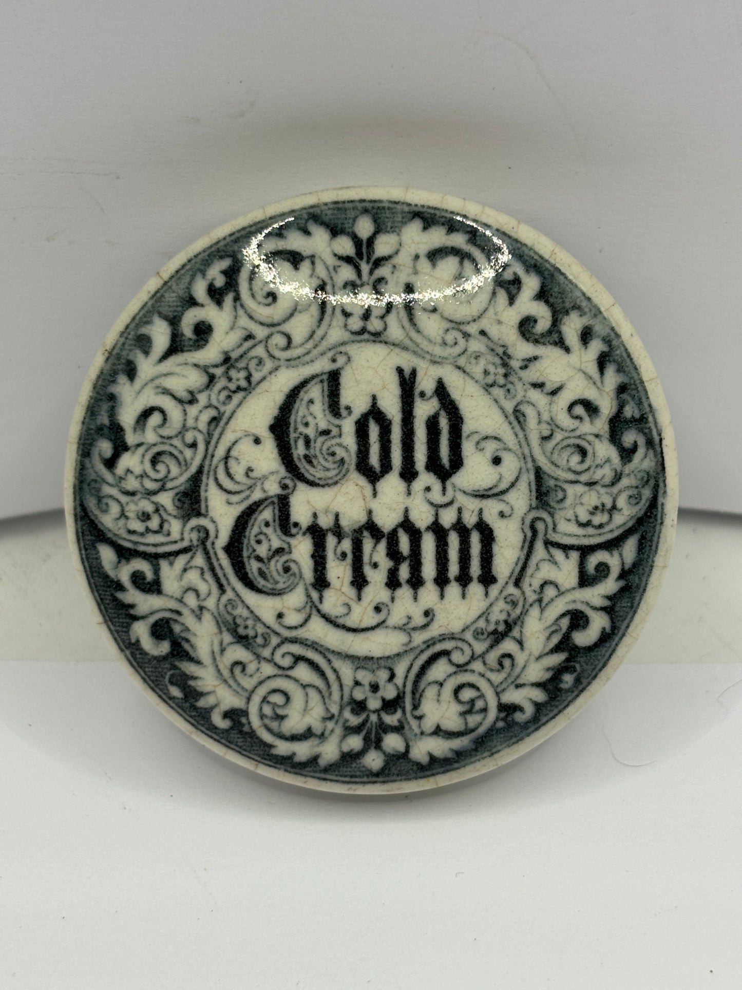 Old cold cream advertising pot lid