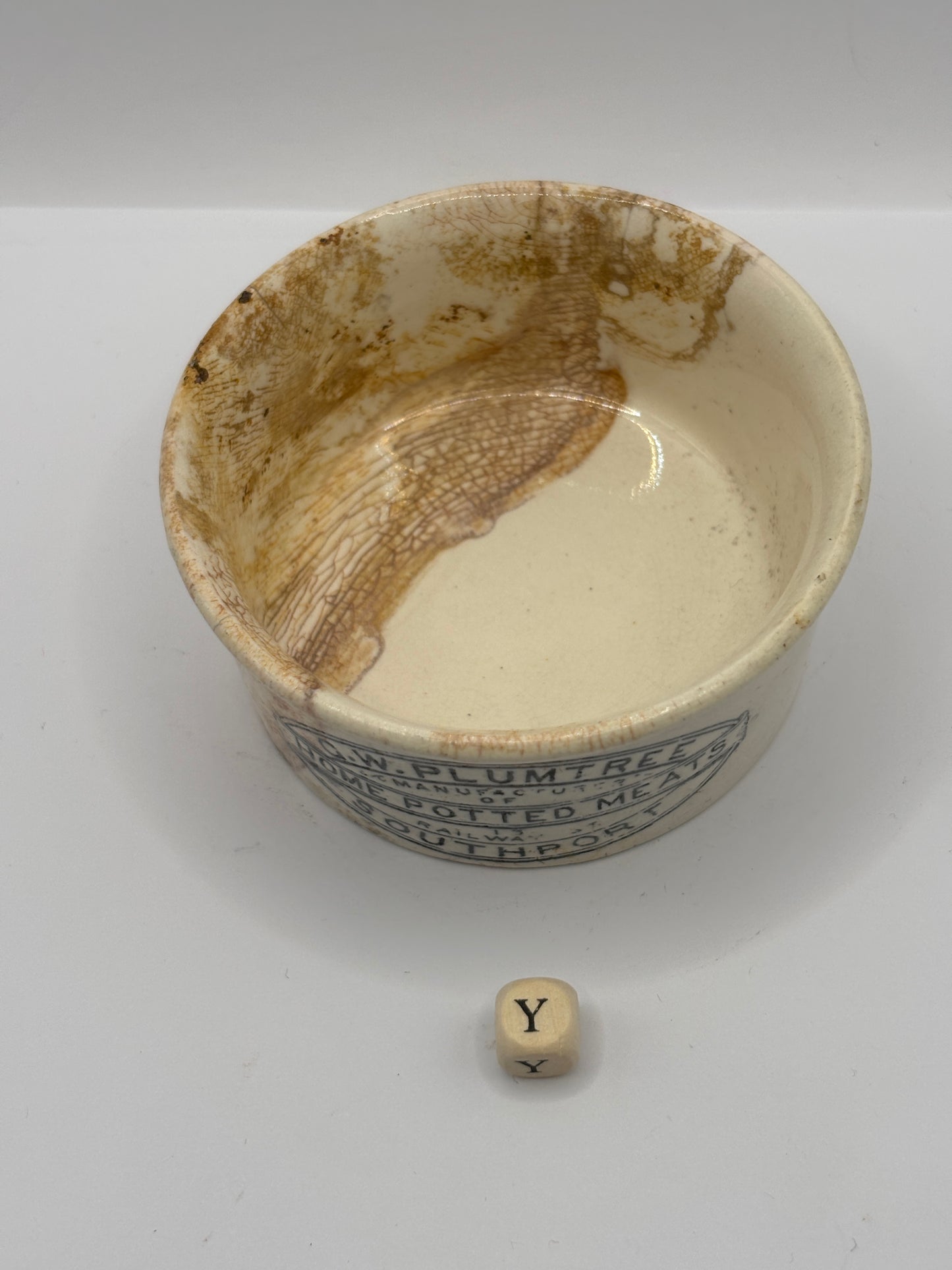 Old Plumtree advertising meat paste pot. Stained & crazed (Y)