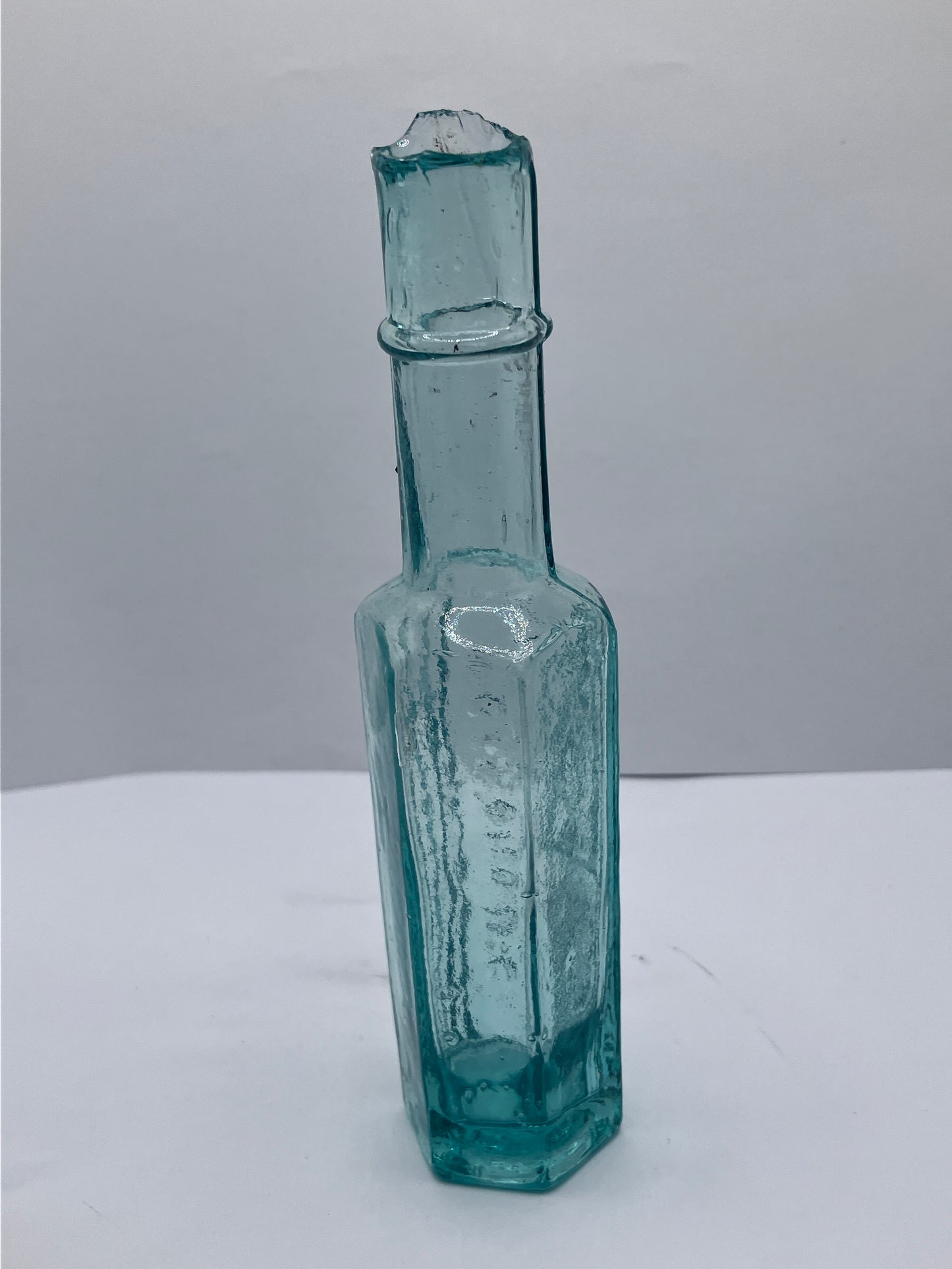 Tall slim poison bottle, poisonous not to be taken