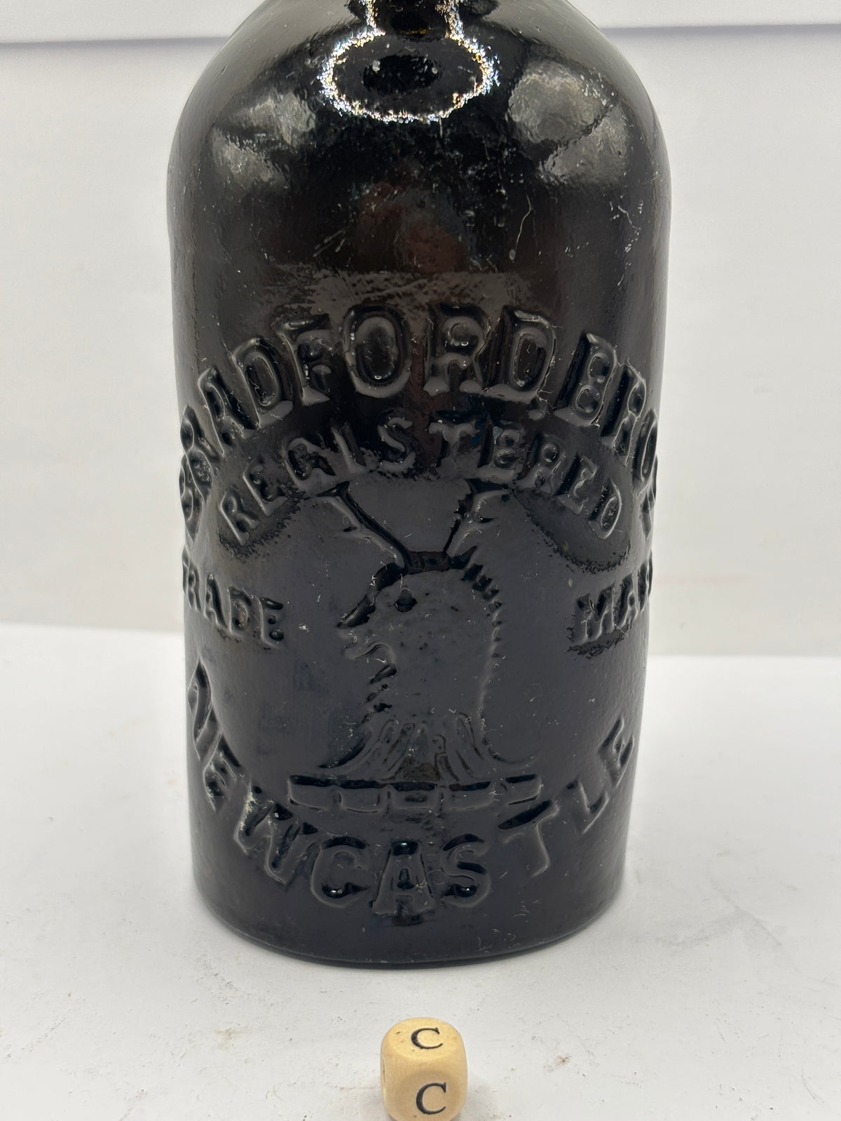 Old advertising beer bottle, Bradford Bros Newcastle (c)
