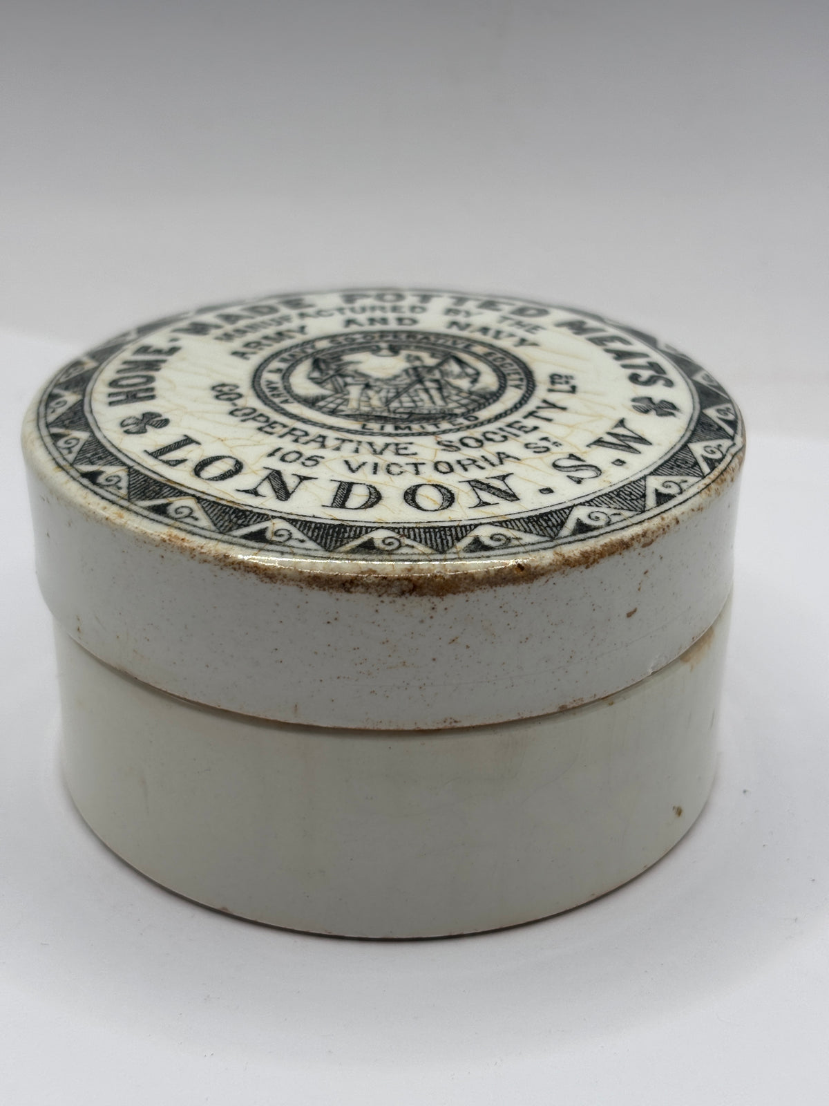Old advertising lid and base. Army & Navy cooperative society home made potted meats