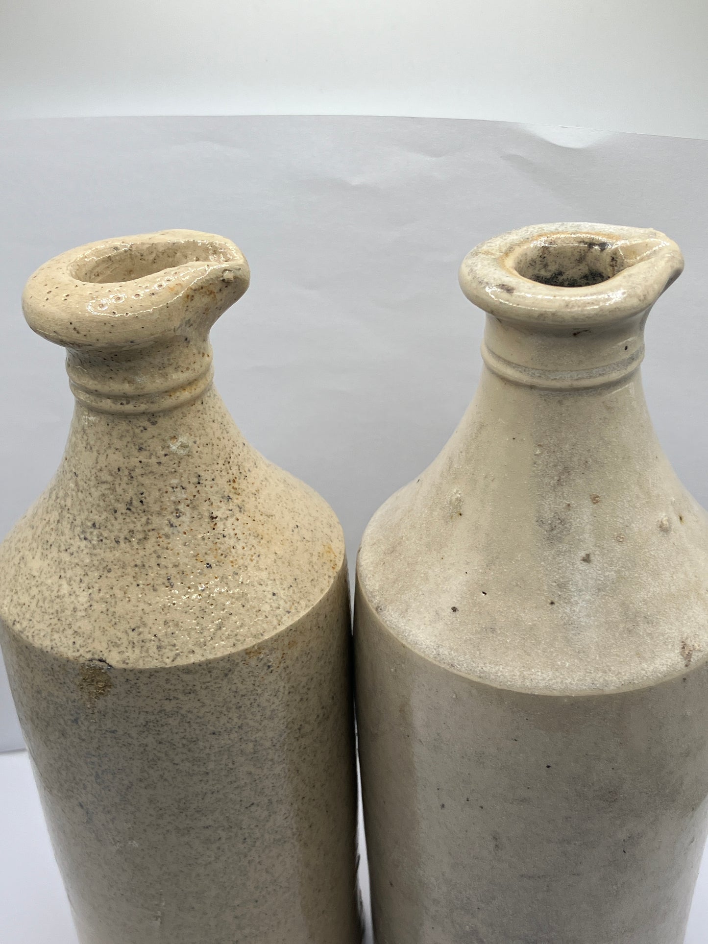 2 tall white stoneware pouring ink bottles