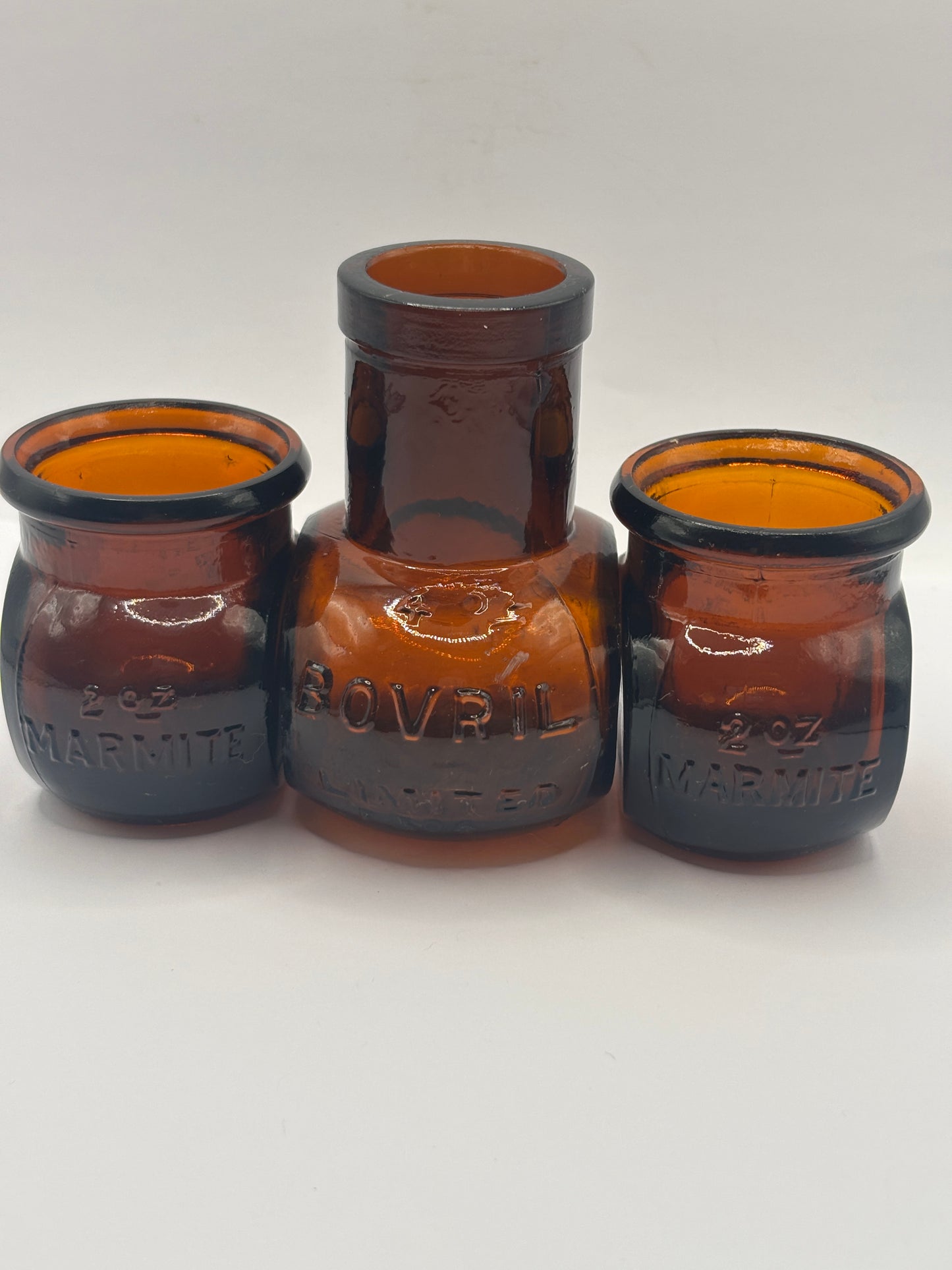 3 old amber glass bottles, marmite & bovril