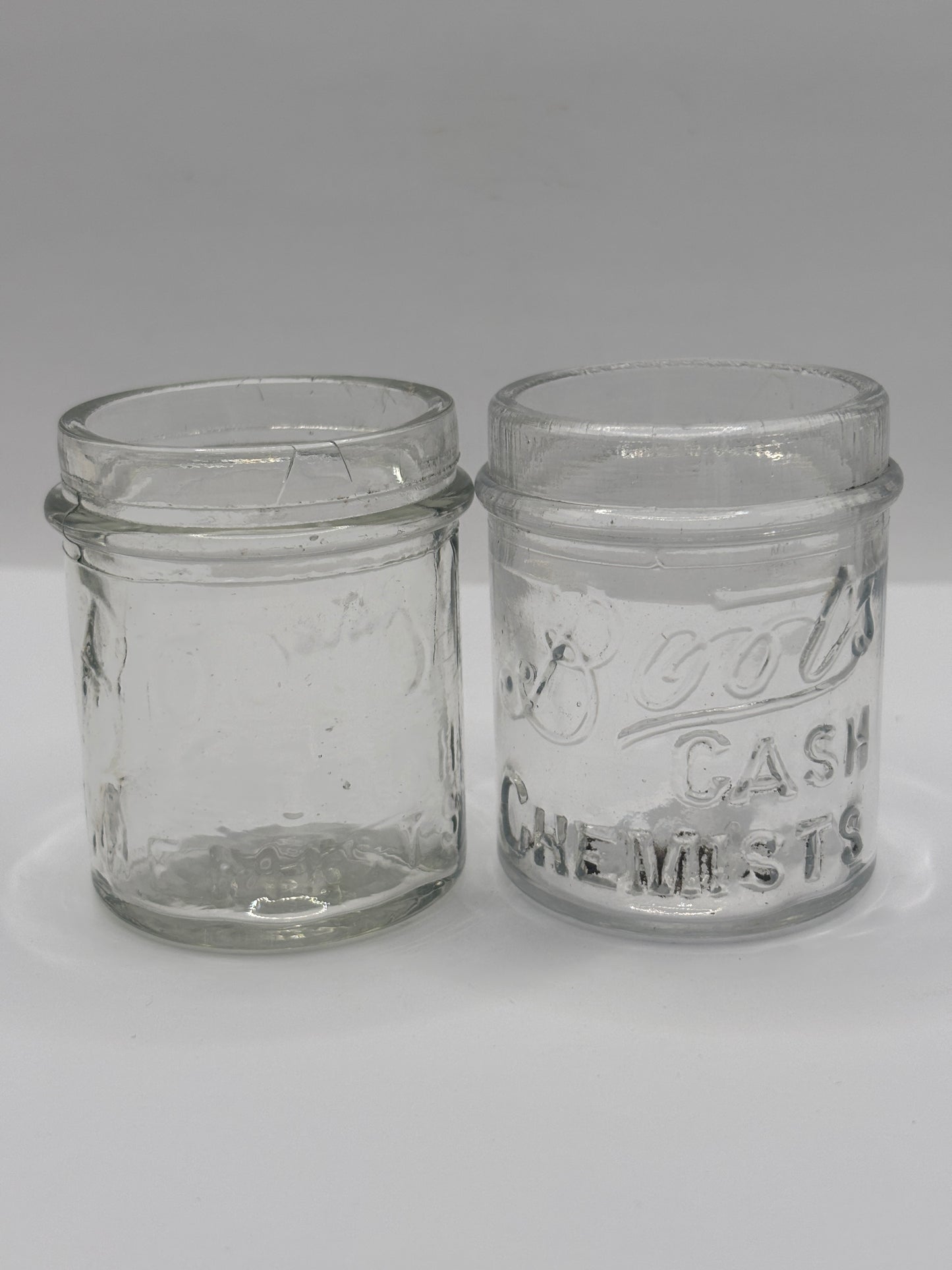2 clear glass Boots cash chemists jars