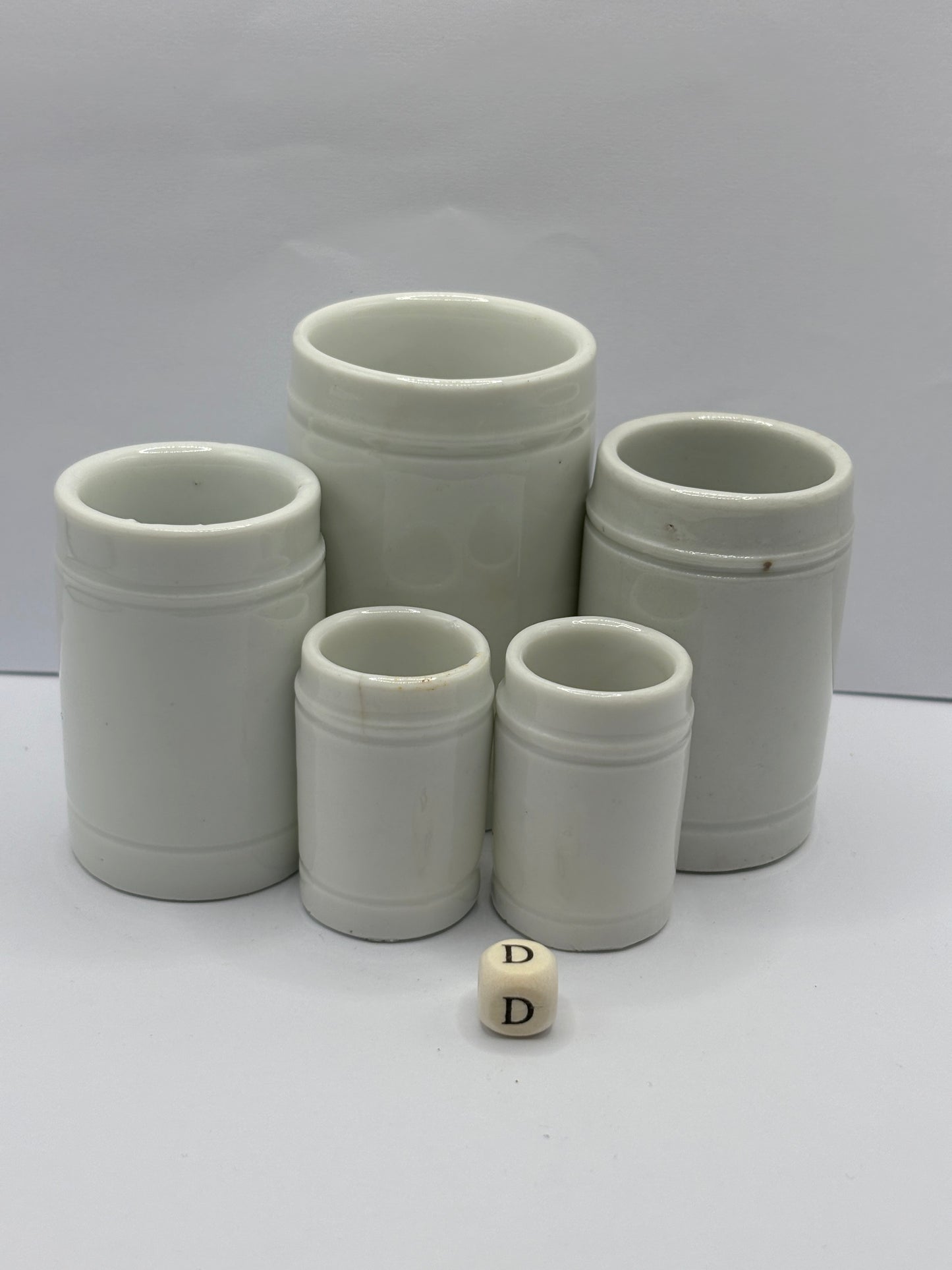 5 small white stoneware pots (D)