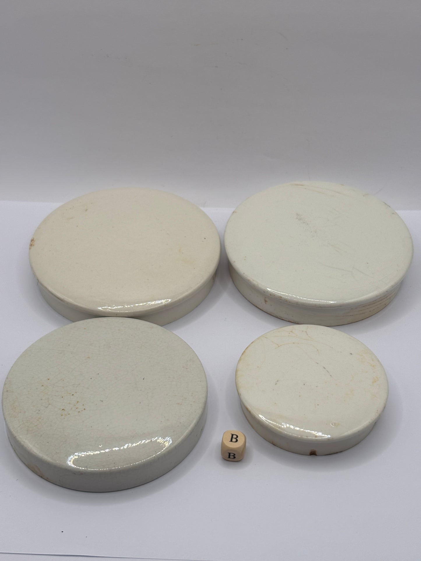 4 old plain stoneware lids, stacking lids (B)