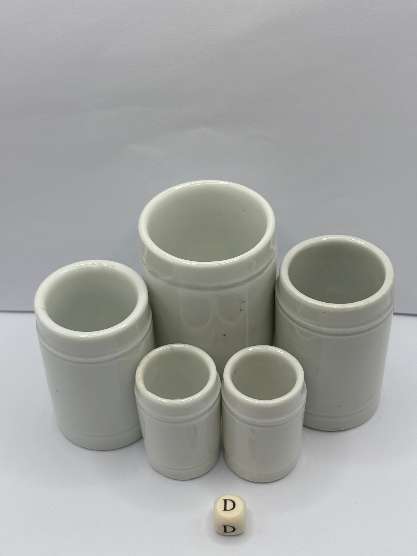 5 small white stoneware pots (D)