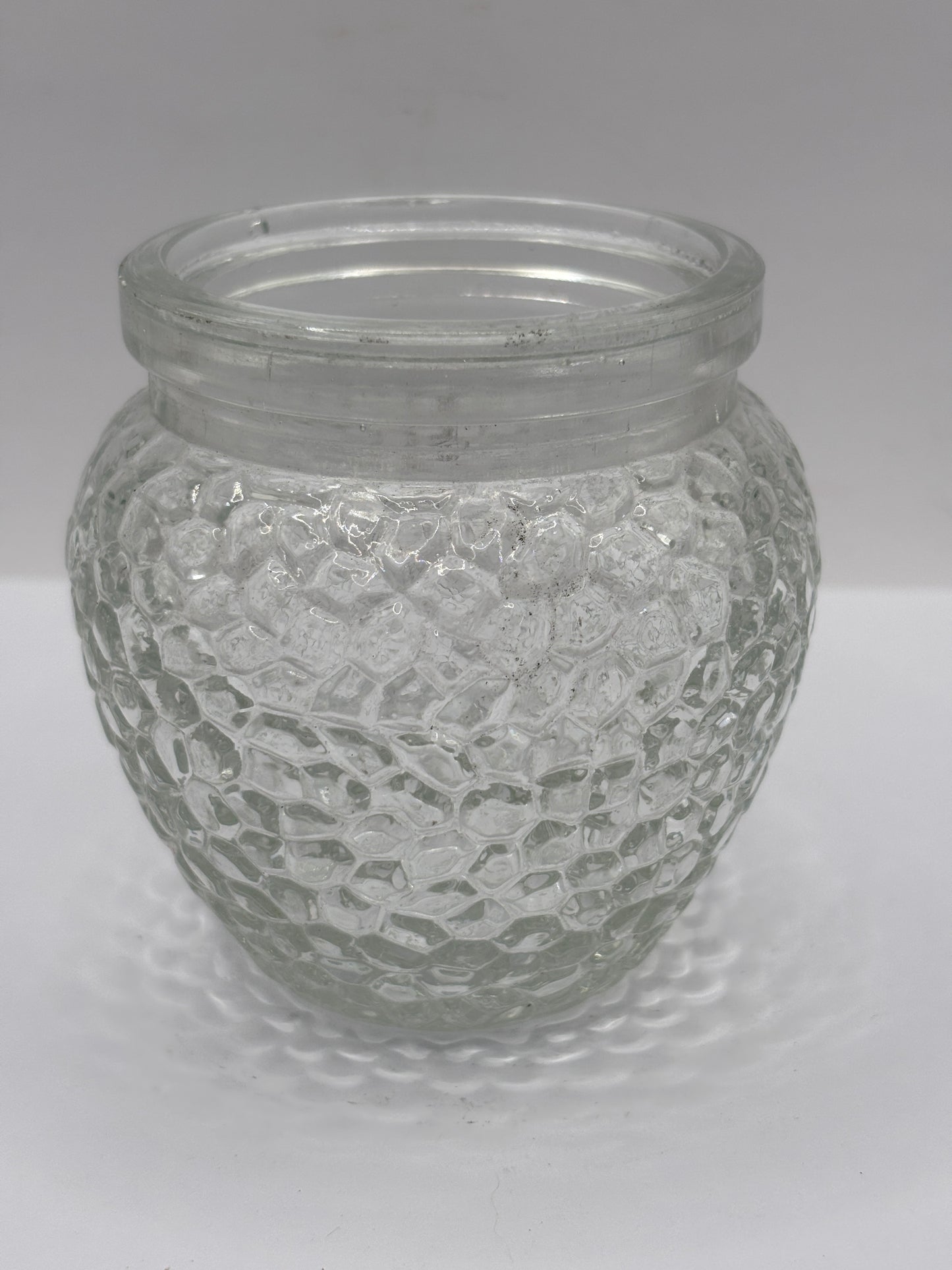 Old clear glass honey jar