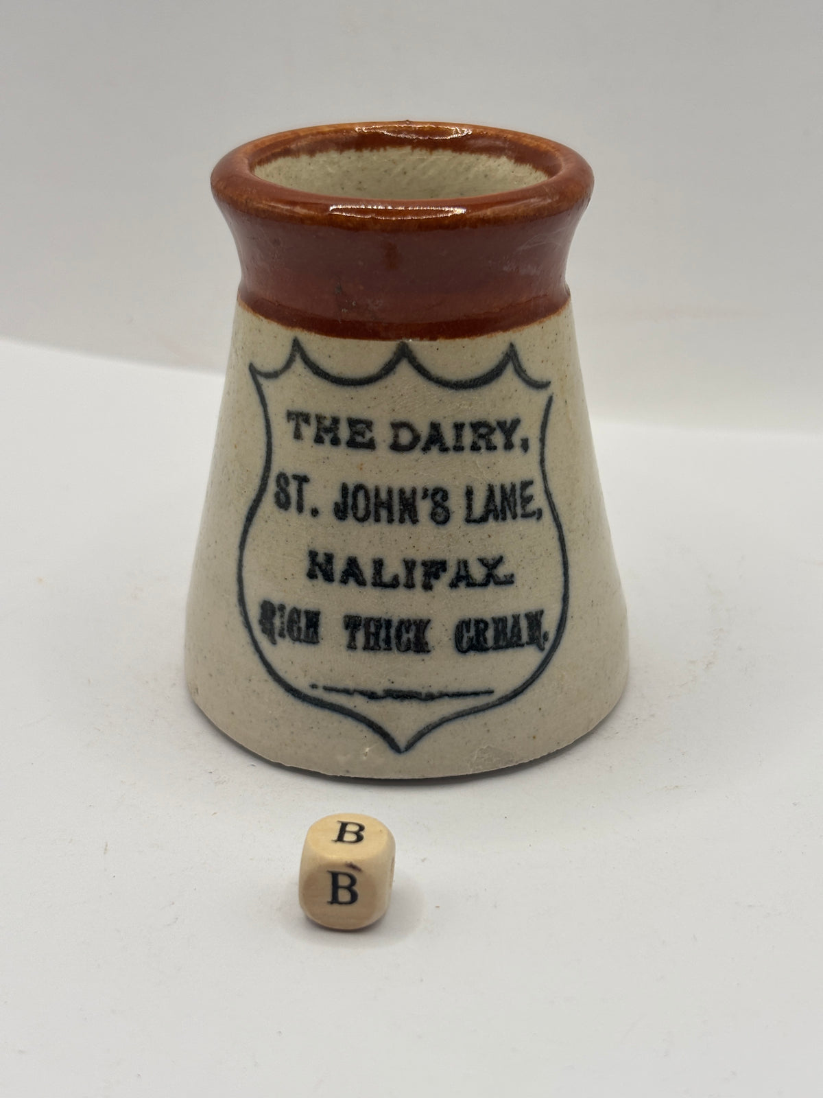 Old advertising cream pot, The dairy, Johns lane, Halifax (B)