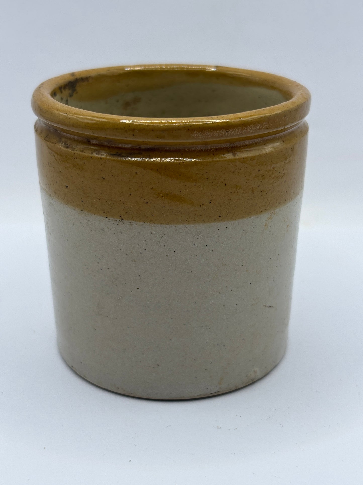 Old small brown top stoneware jar