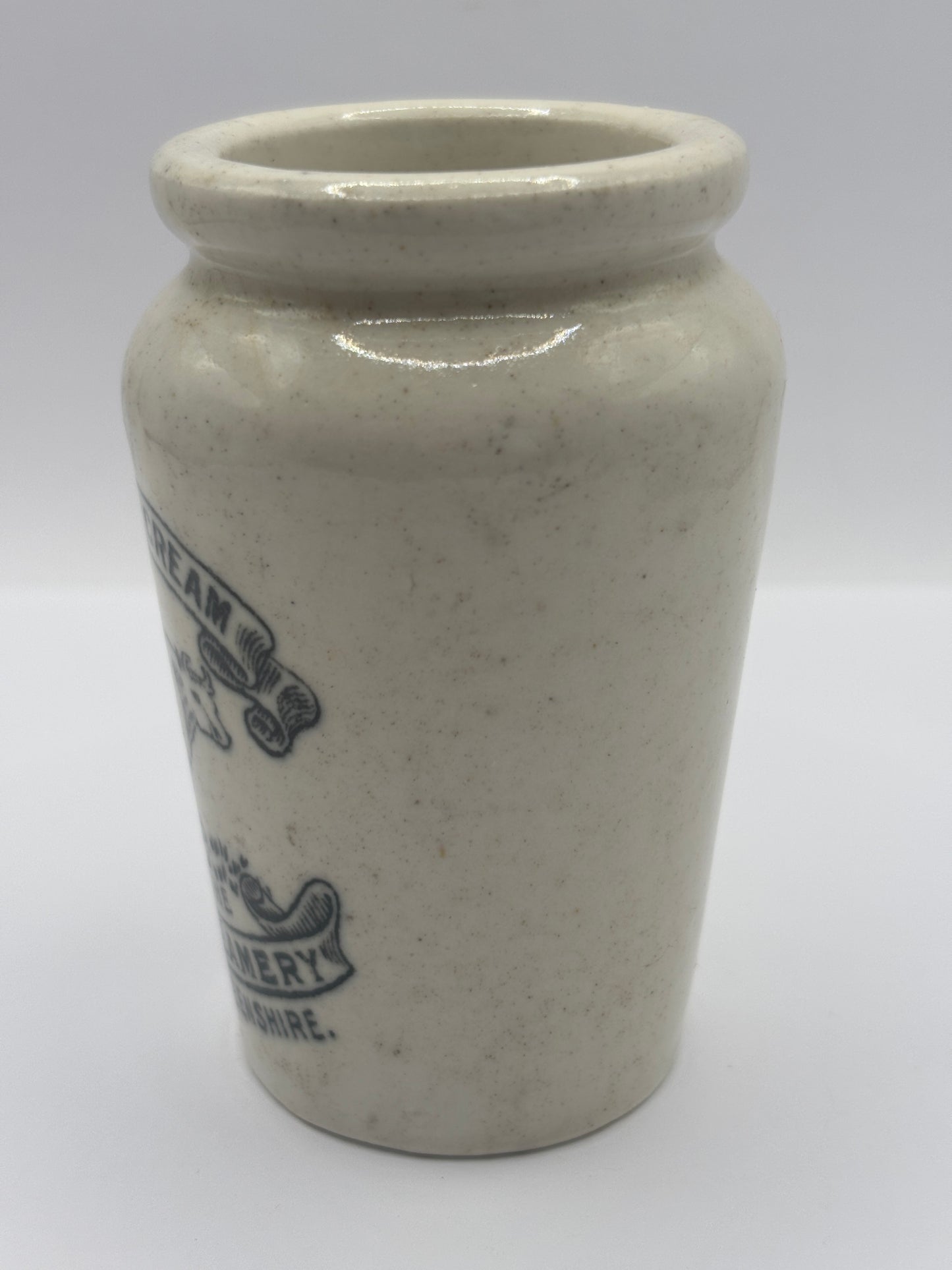 Old advertising cream pot, Huntly creamery. Milk maid. Pure rich cream