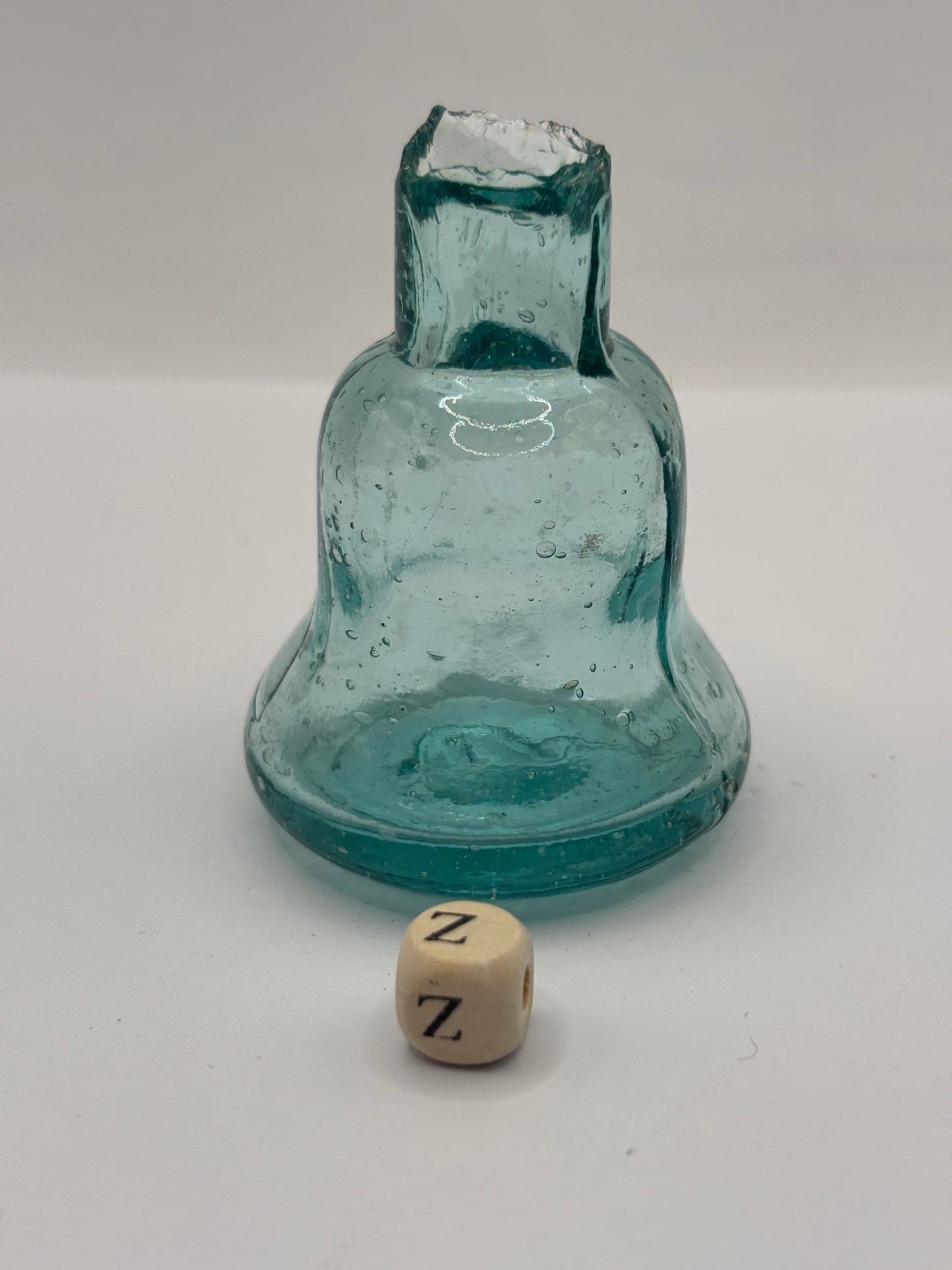 Old aqua glass inkwell, Bell ink (Z)