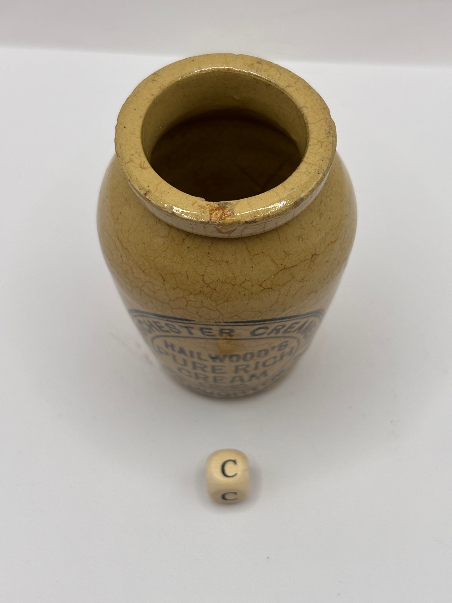 Old advertising cream pot, Manchester creamery Hailwoods cream (c) chipped