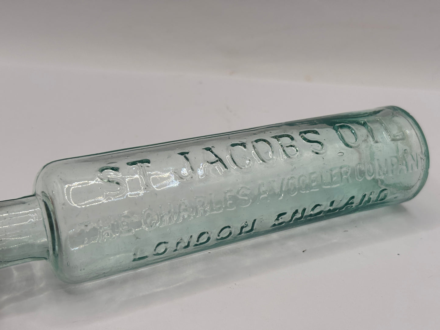 Old aqua glass bottle, St Jacobs oil