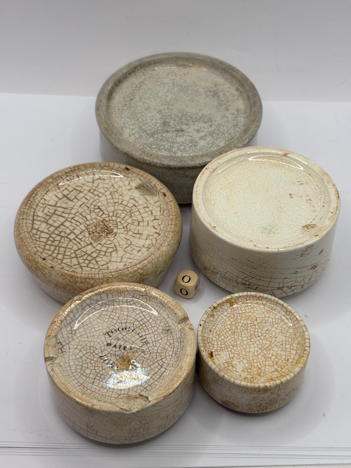 5 old stained & crazed bases, stackers (o) damages