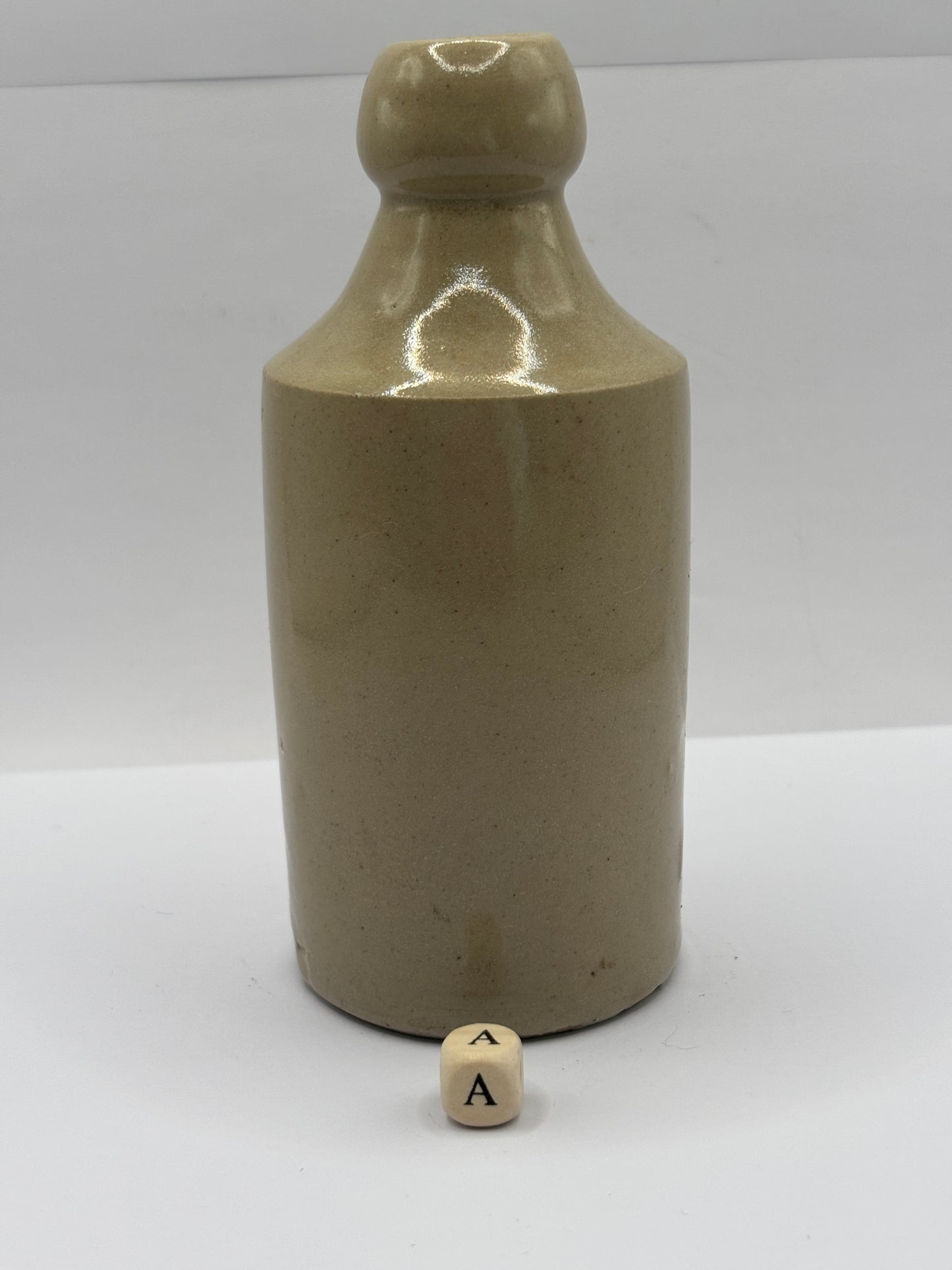 Old small plain stoneware ginger beer bottle (a) 13cms
