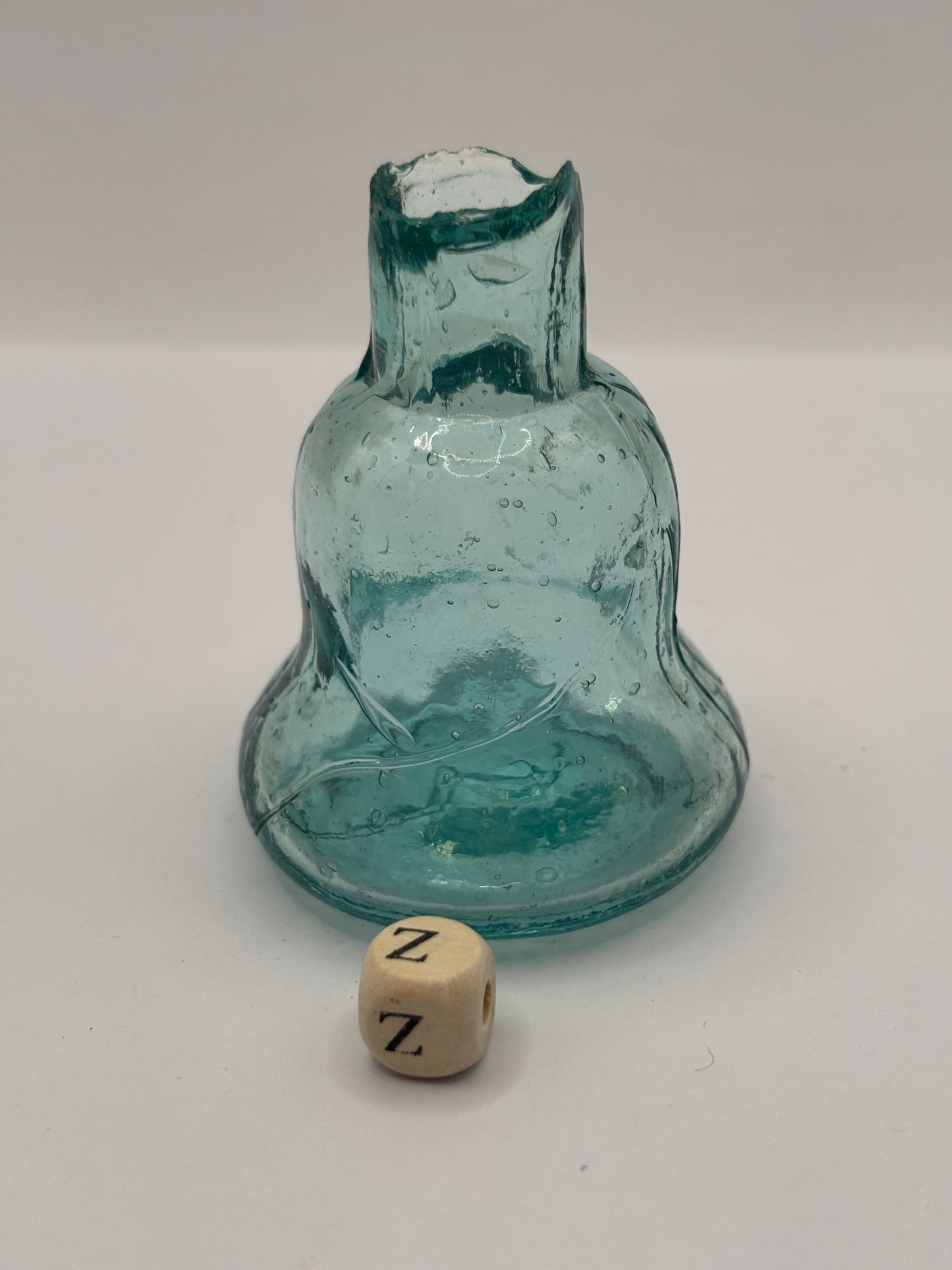 Old aqua glass inkwell, Bell ink (Z)