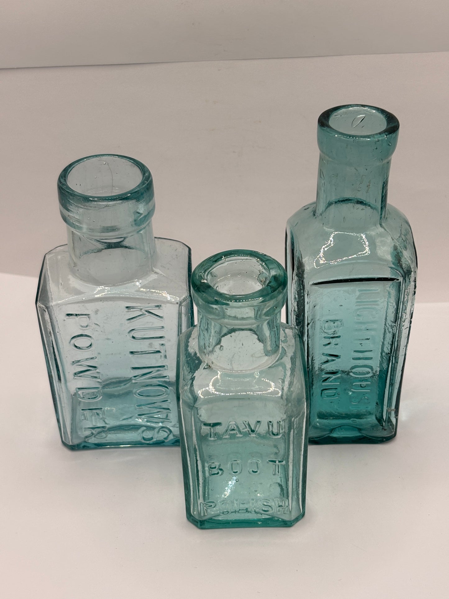 3 old aqua glass advertising chemist bottles