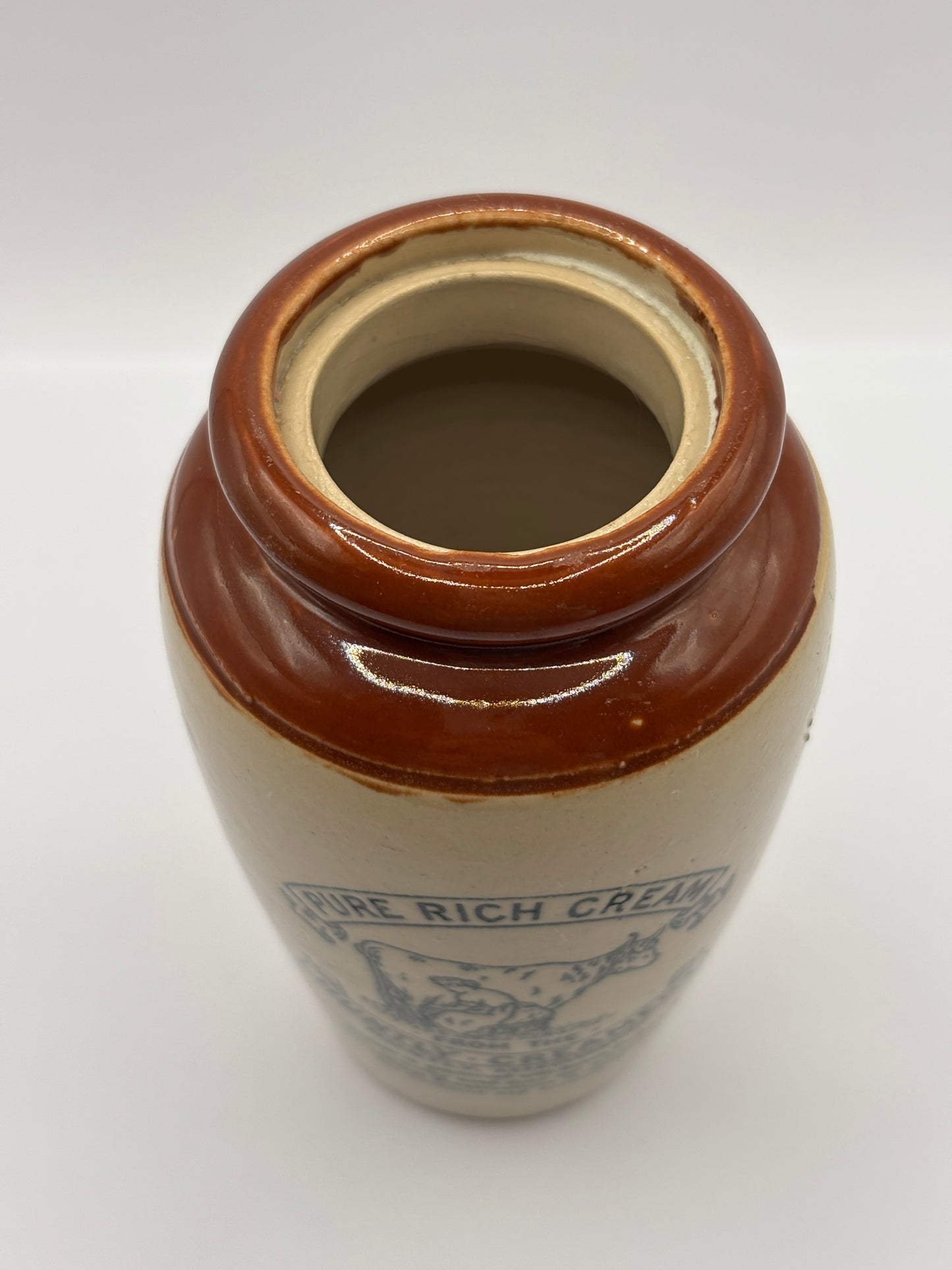Old advertising cream pot, Huntly creamery. Milk maid. Pure rich cream
