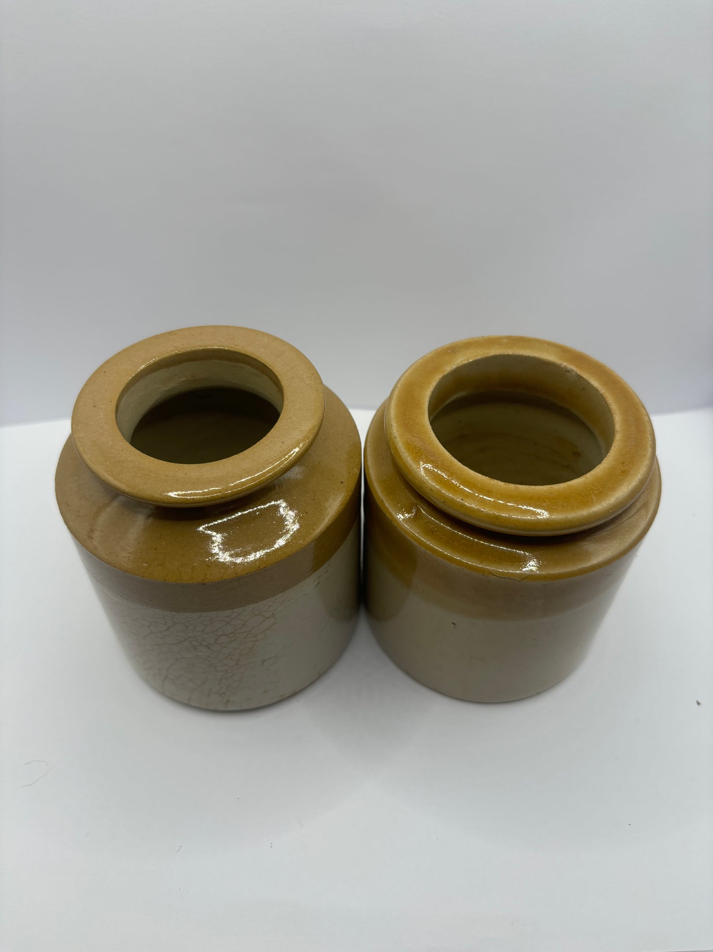 2 small stoneware jars