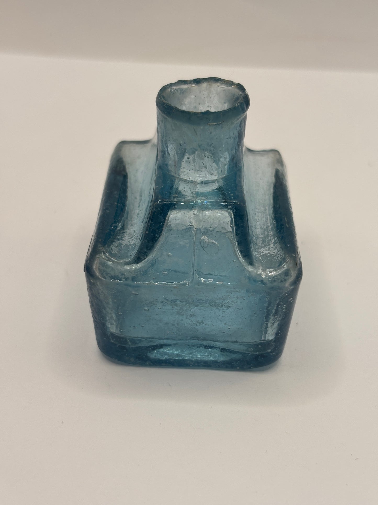 Old blue glass inkwell, ink bottle, penny ink. Boat ink