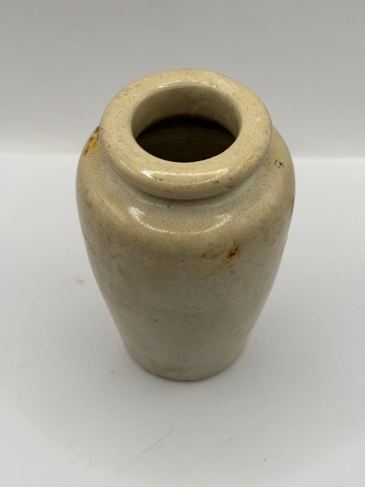 Old stained stoneware cream pot