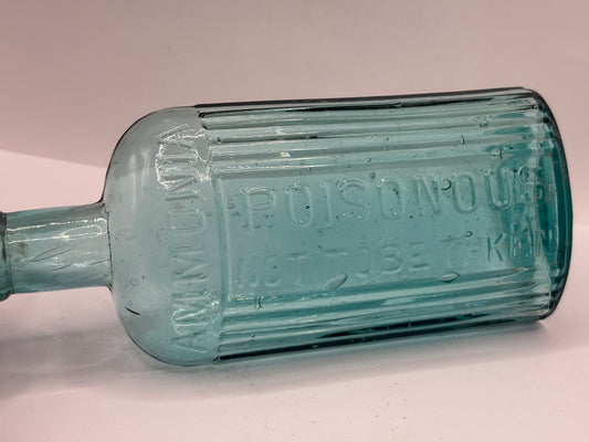 Old aqua glass poison bottle, ammonia, POISONOUS not to be taken