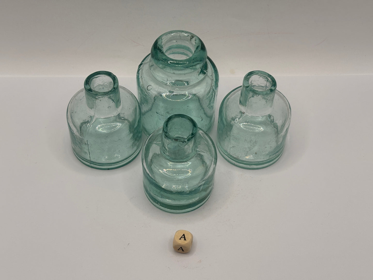 4 old aqua glass inks, inkwells, ink bottles, smooth top (a)
