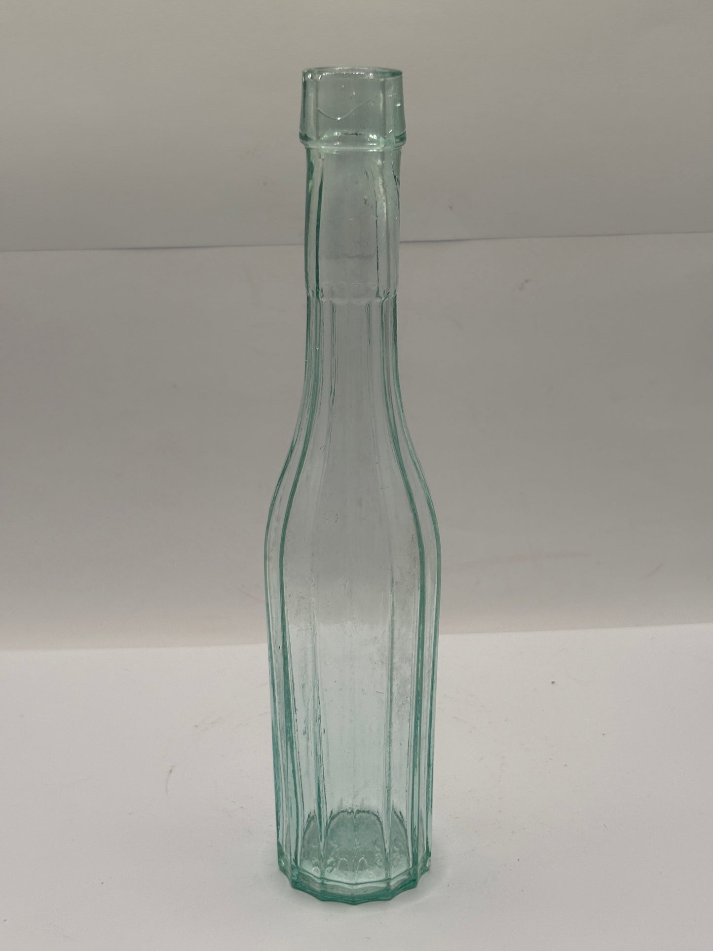 Old aqua glass bottle, vinegar?