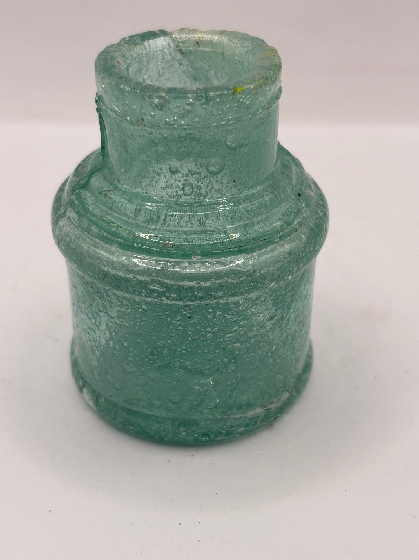 Old aqua glass ink with lots of bubbles