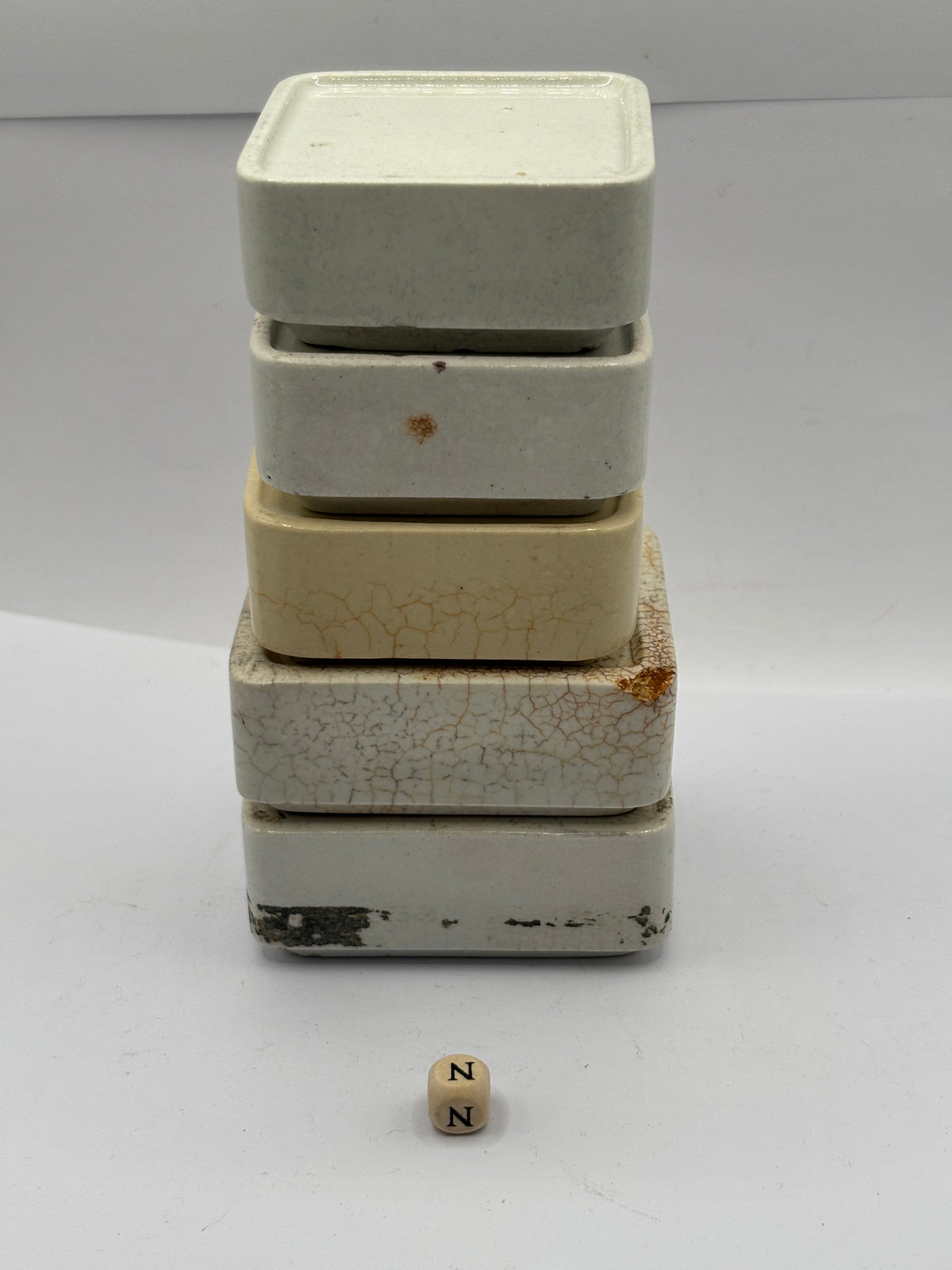 5 old square stoneware pot lid bases, stackers