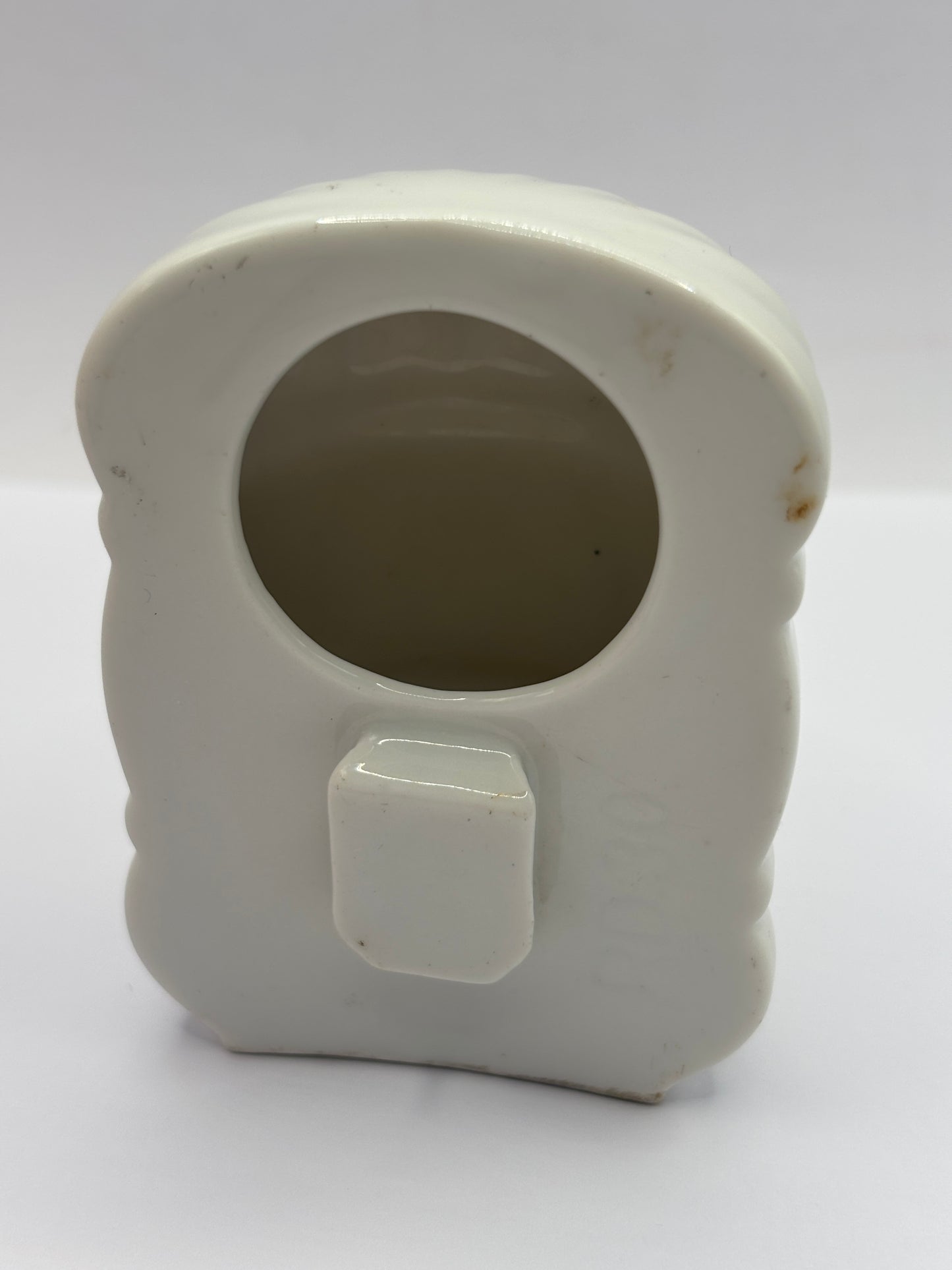 Old ceramic bird feeder