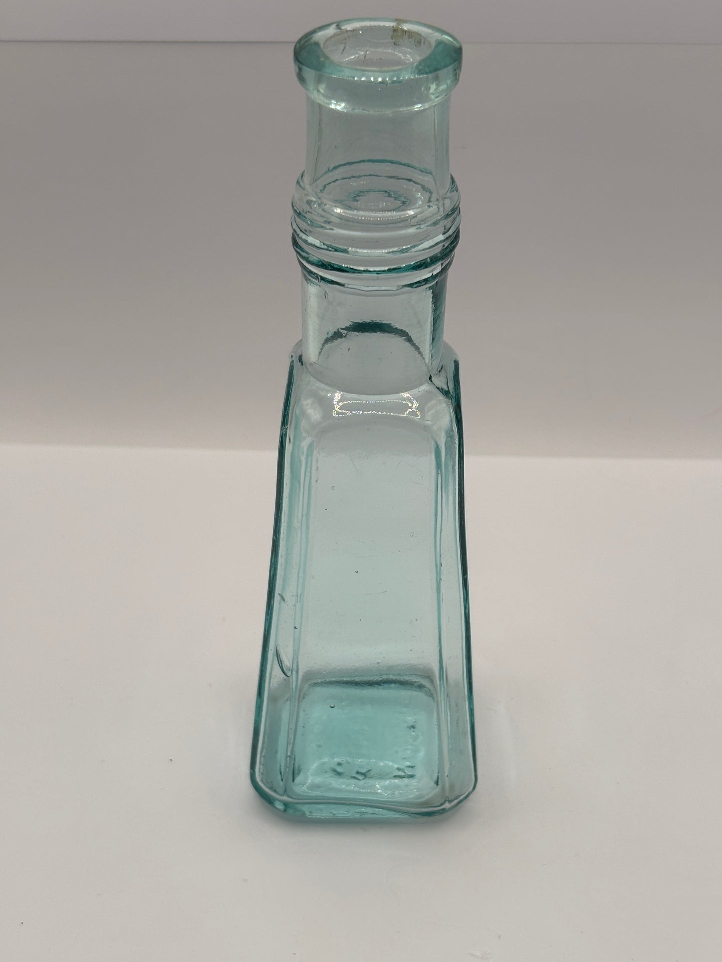 Old aqua glass sauce bottle