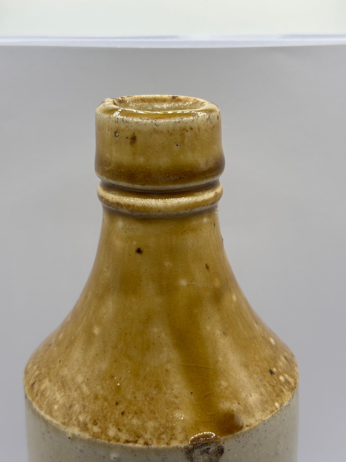 Old plain stoneware ginger beer bottle
