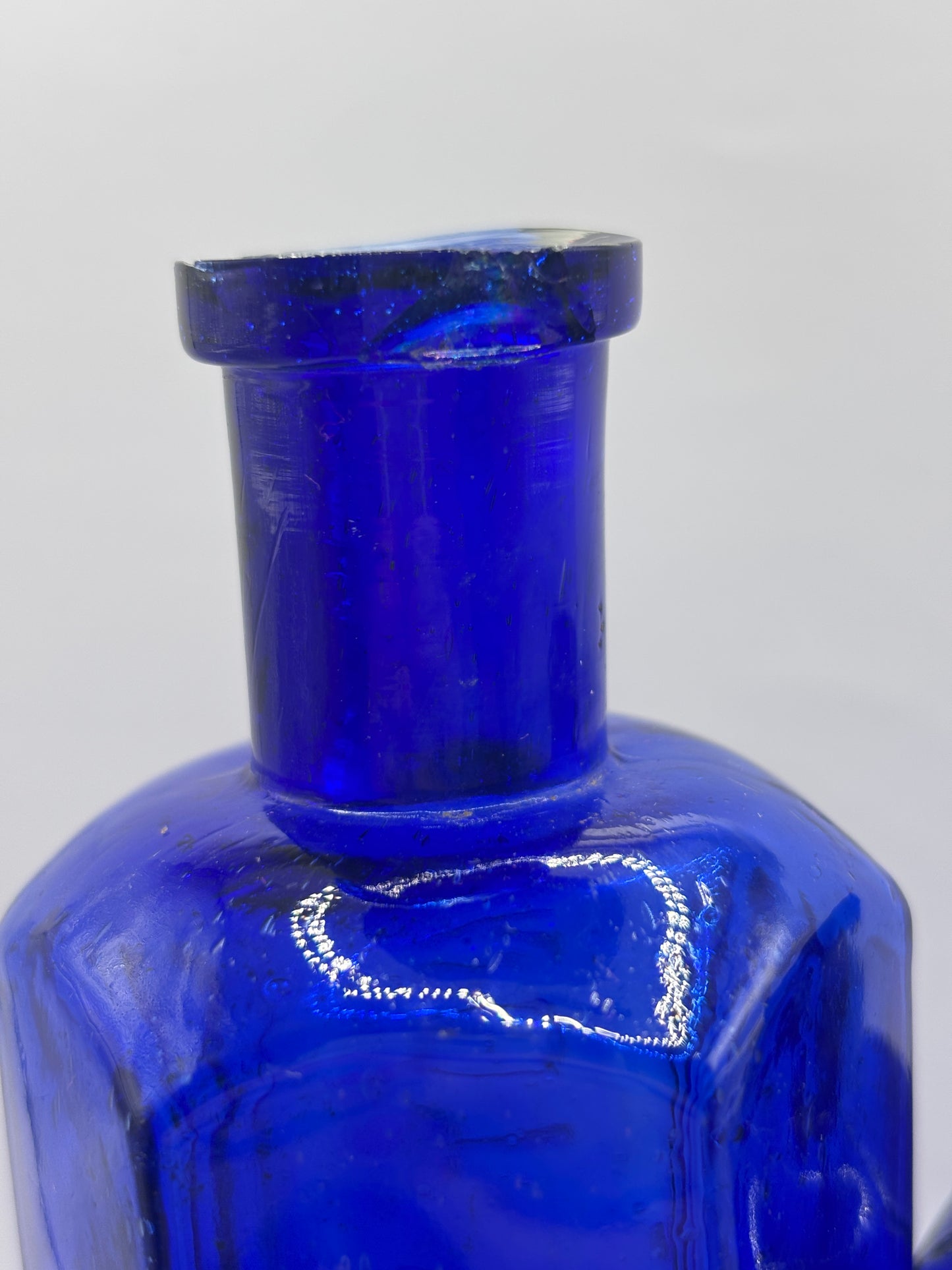 2 Old blue glass ribbed poison bottles. ‘not to be taken’ (C) damaged