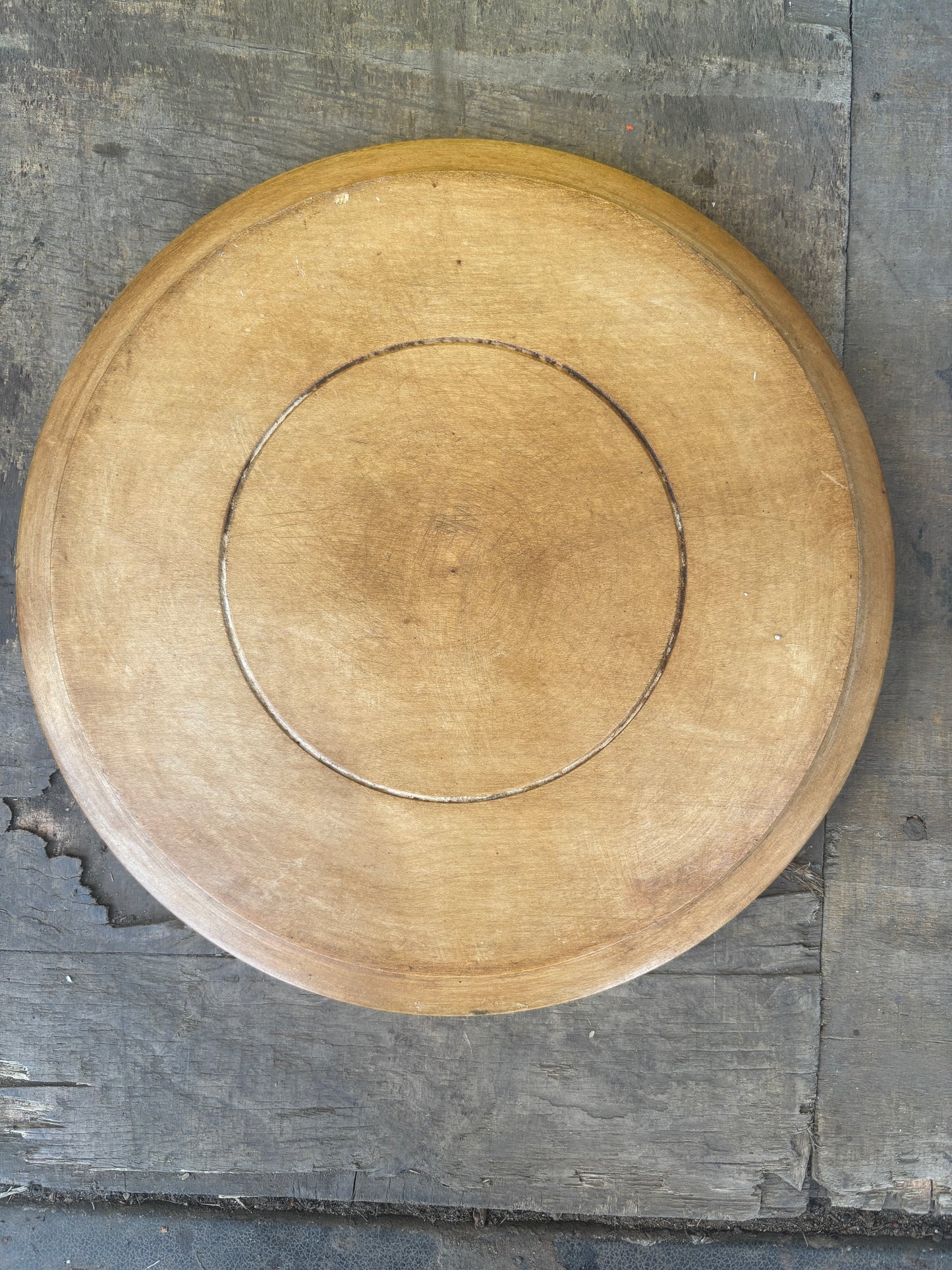 Old wooden carved bread board