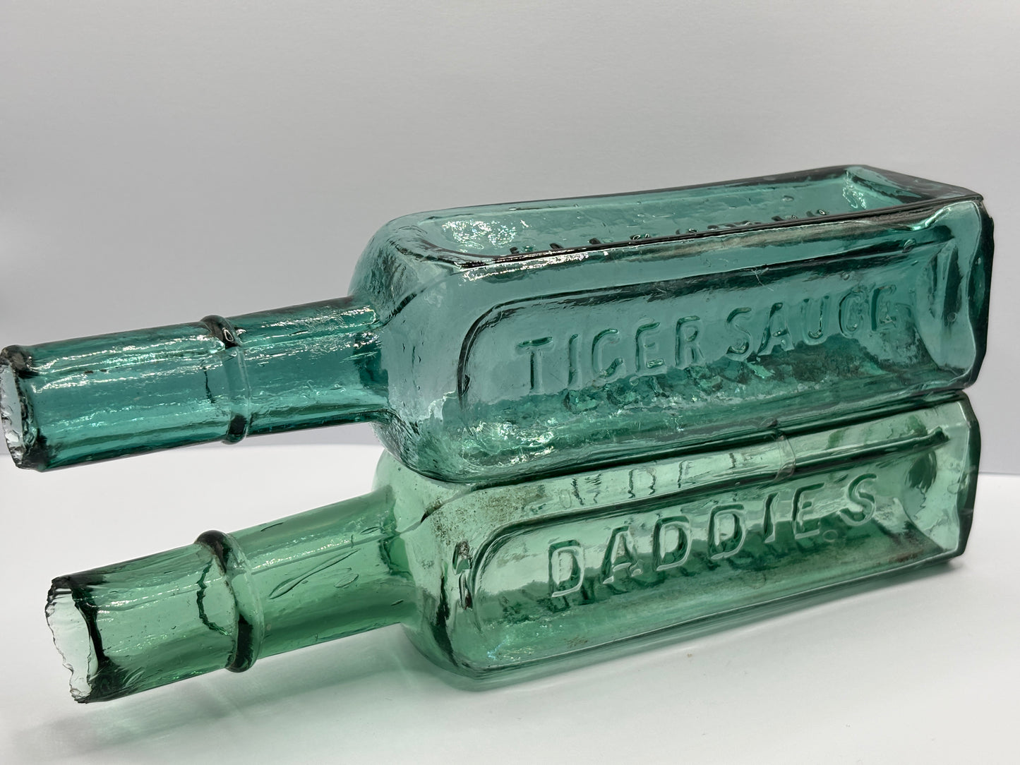 2 Old sauce bottles, Daddies sauce & Fletchers tiger sauce