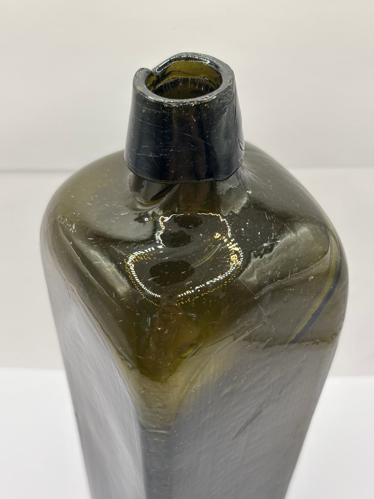 Old green glass gin bottle, case gin