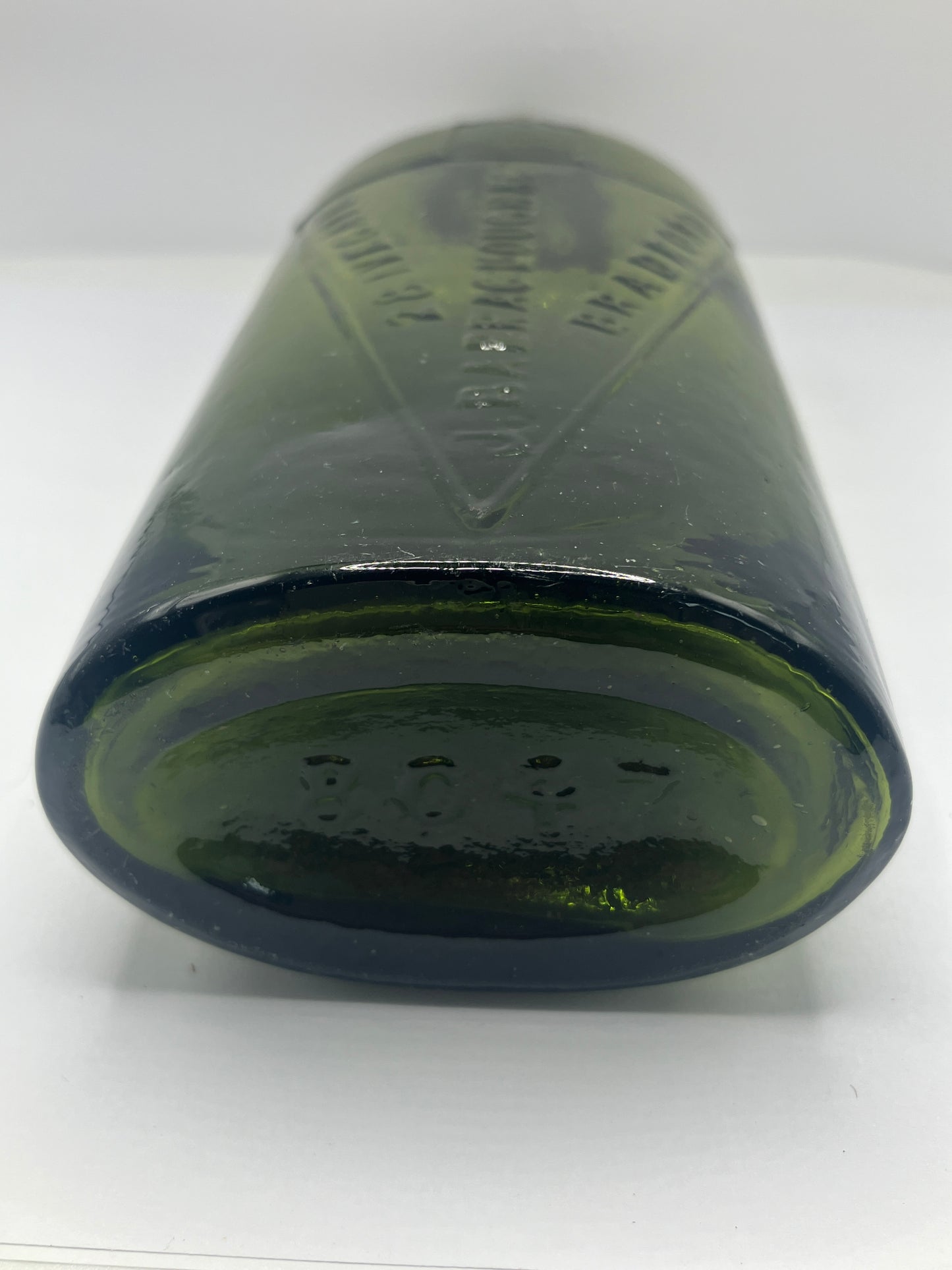 Dark green Bradford chemist bottle