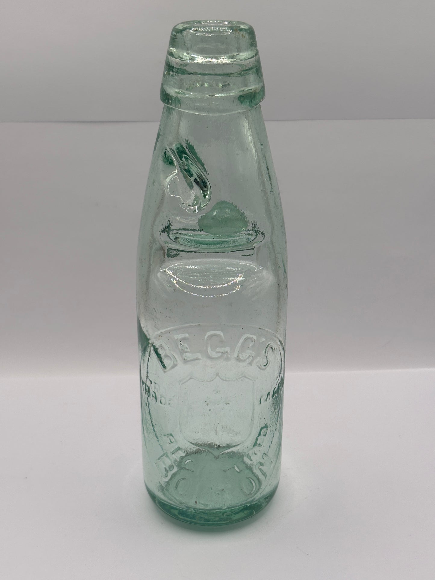 Old Bolton codd bottle, with marble. Begg’s