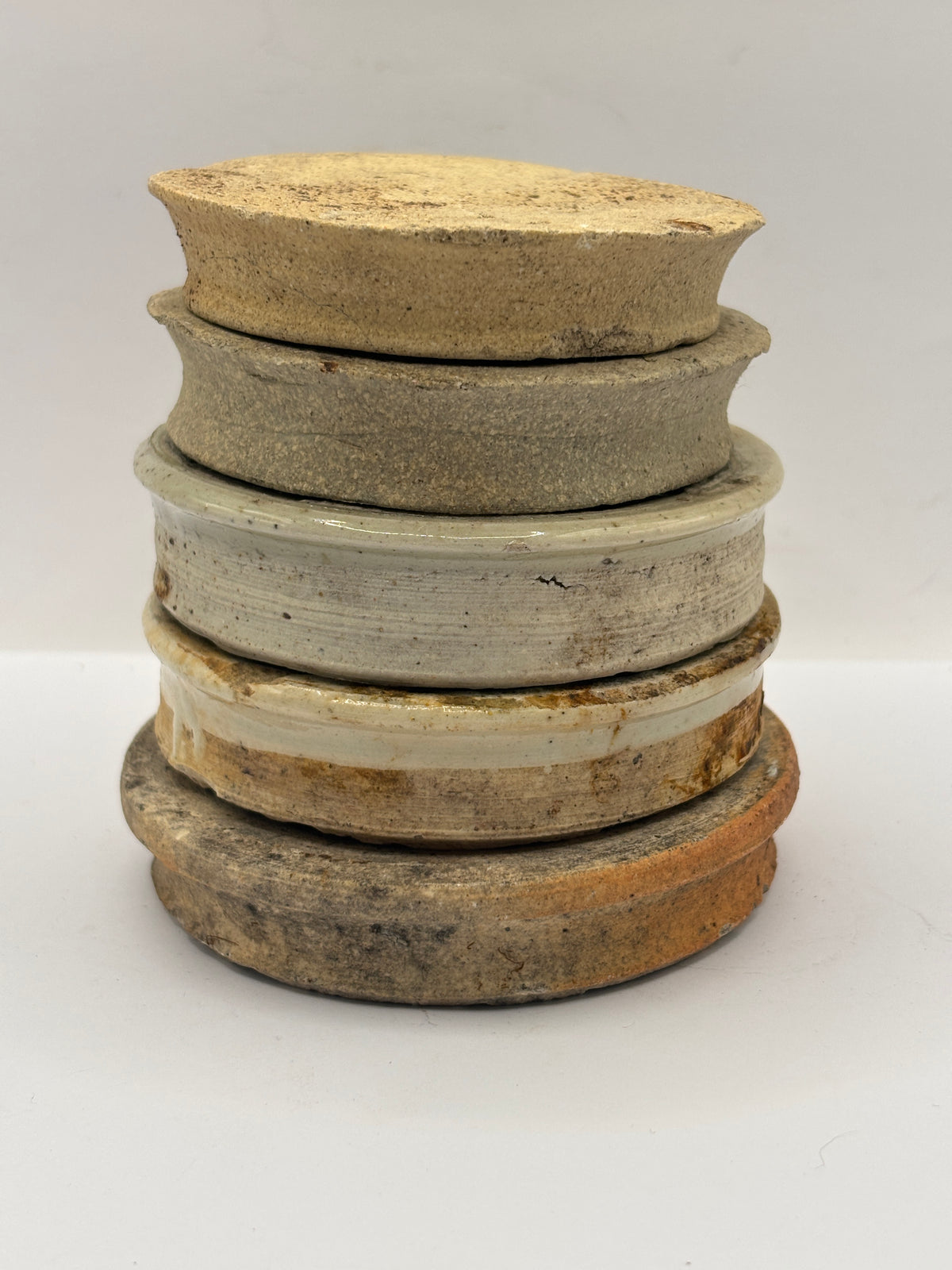 5 old stoneware ginger jar lids, stackers