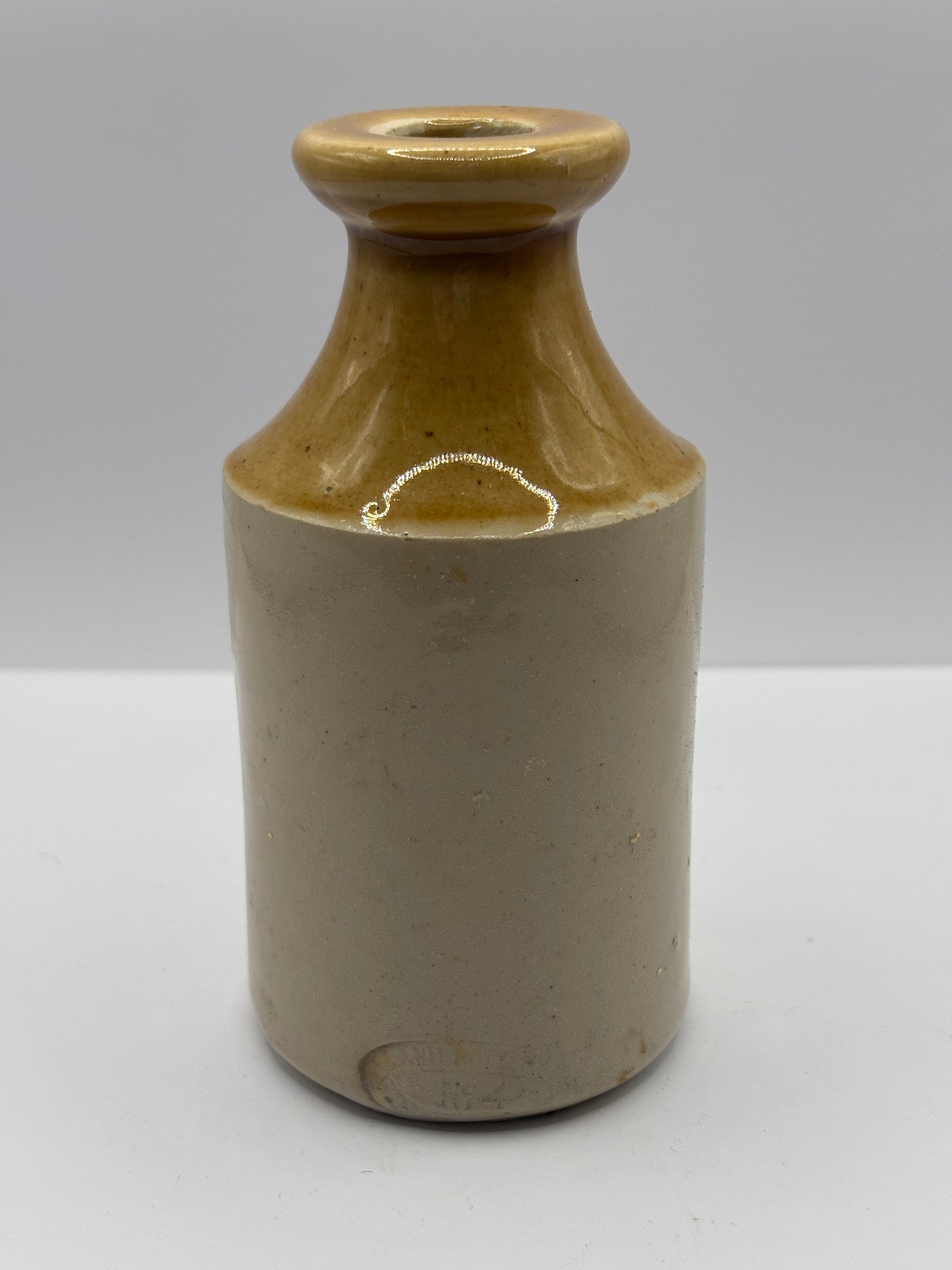 Old brown top stoneware pot, small vase