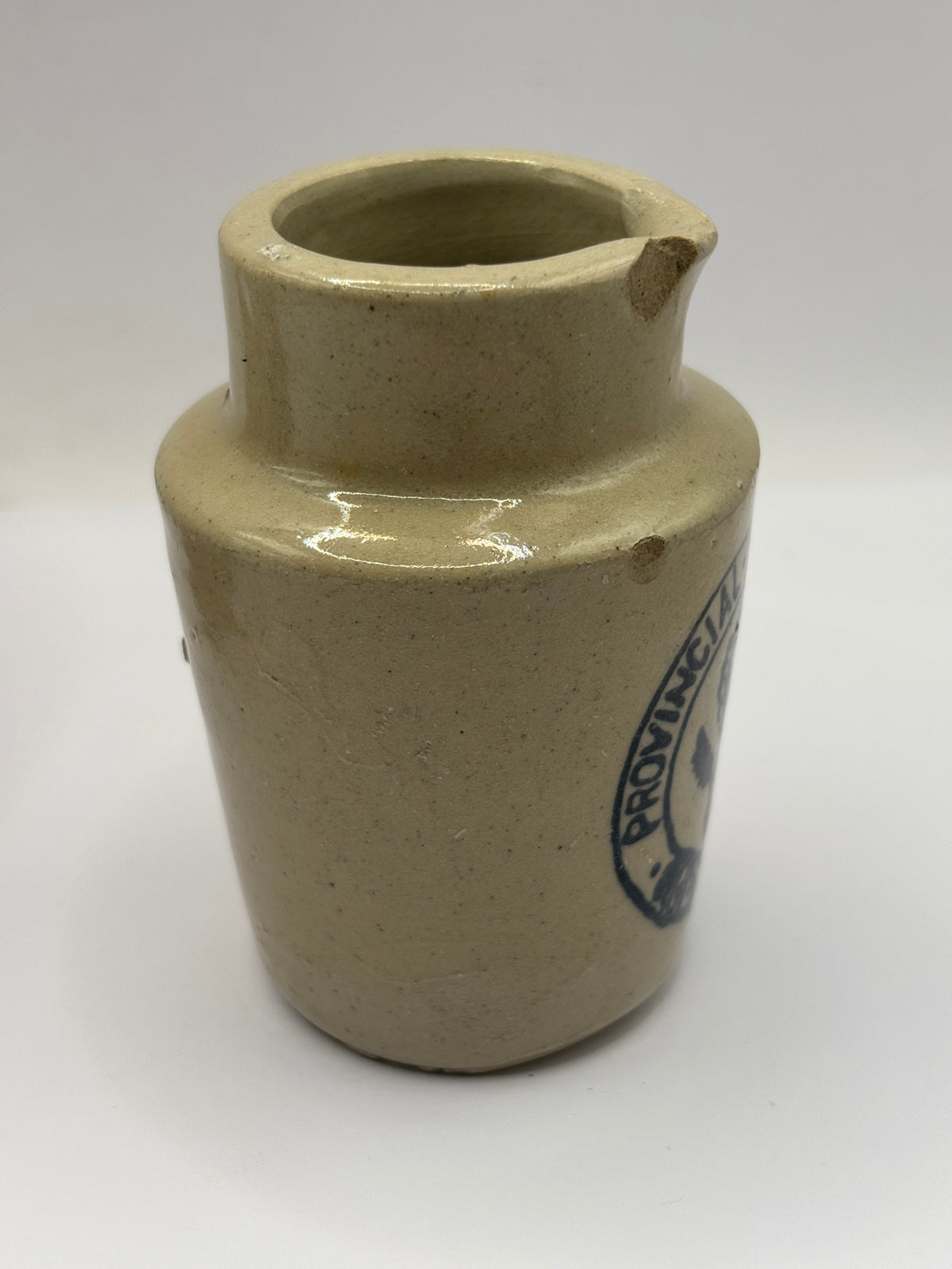 Old advertising cream pot, Provinical dairies Leeds. Chipped