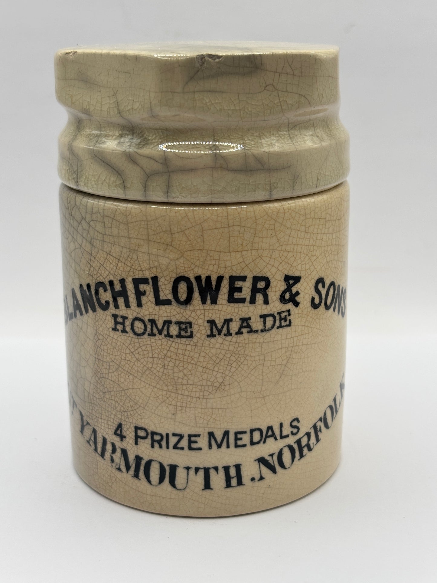 Old stoneware potted meat jar and lid. Blanchflower